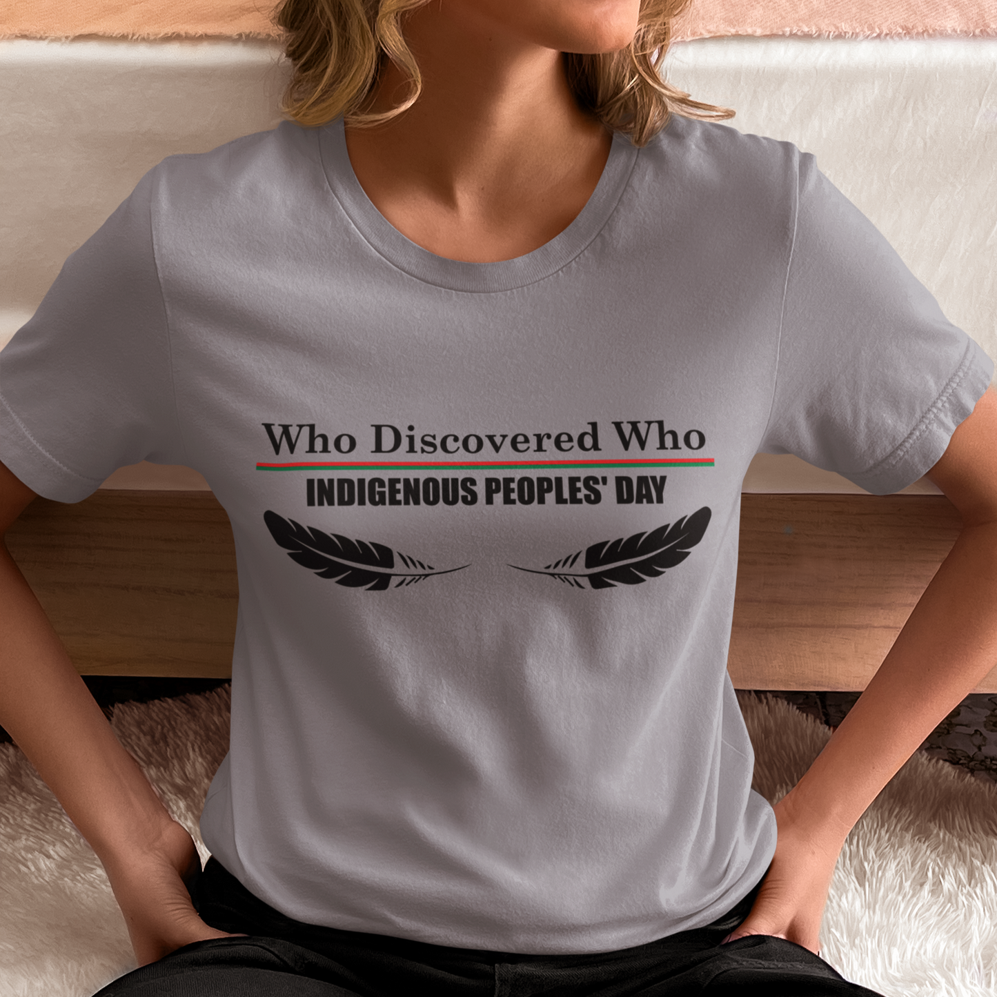 Person wearing a t-shirt with 'Who Discovered Who Indigenous Peoples' Day' text