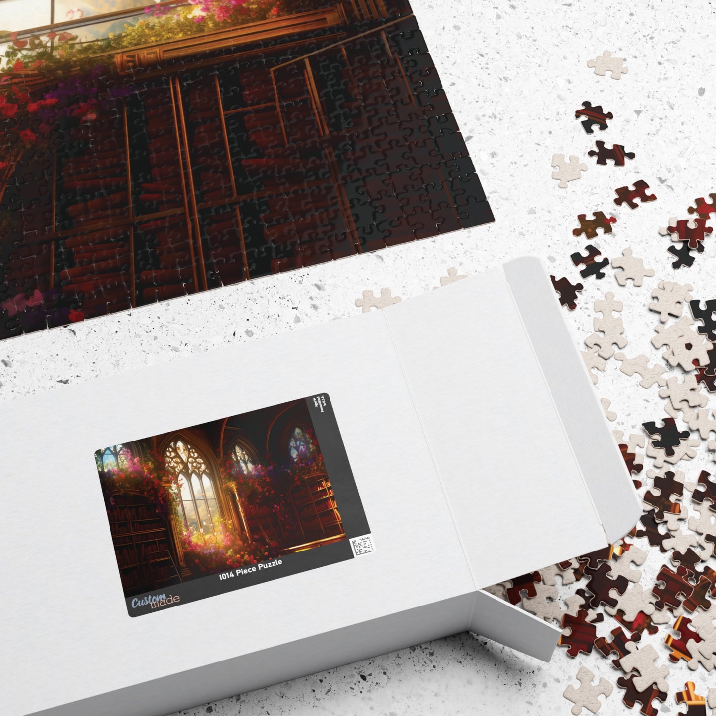 Jigsaw puzzle with completed pieces and a box featuring a cathedral image on a light surface.