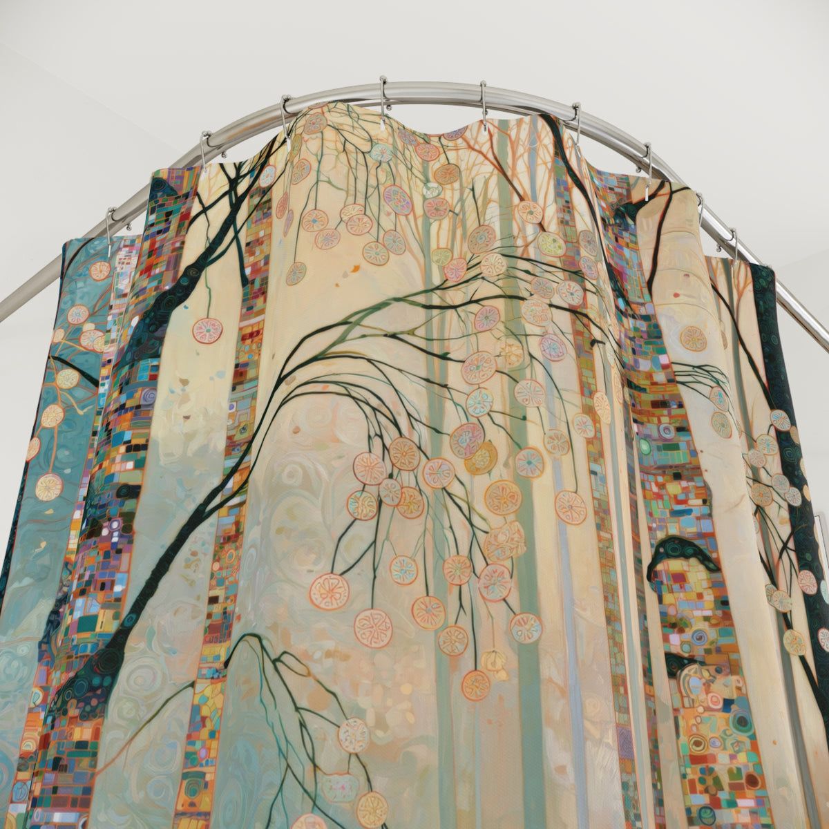 A large decorative shower curtain hanging from a curved metal rod, featuring an artistic forest scene with tree branches, hanging circular motifs, and multicolored mosaic-style side panels on a plain light background.