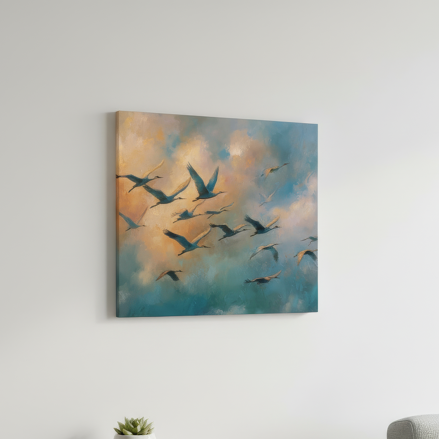 Canvas print of birds flying in a blue and orange sky above a wooden shelf with a plant and a gray chair.