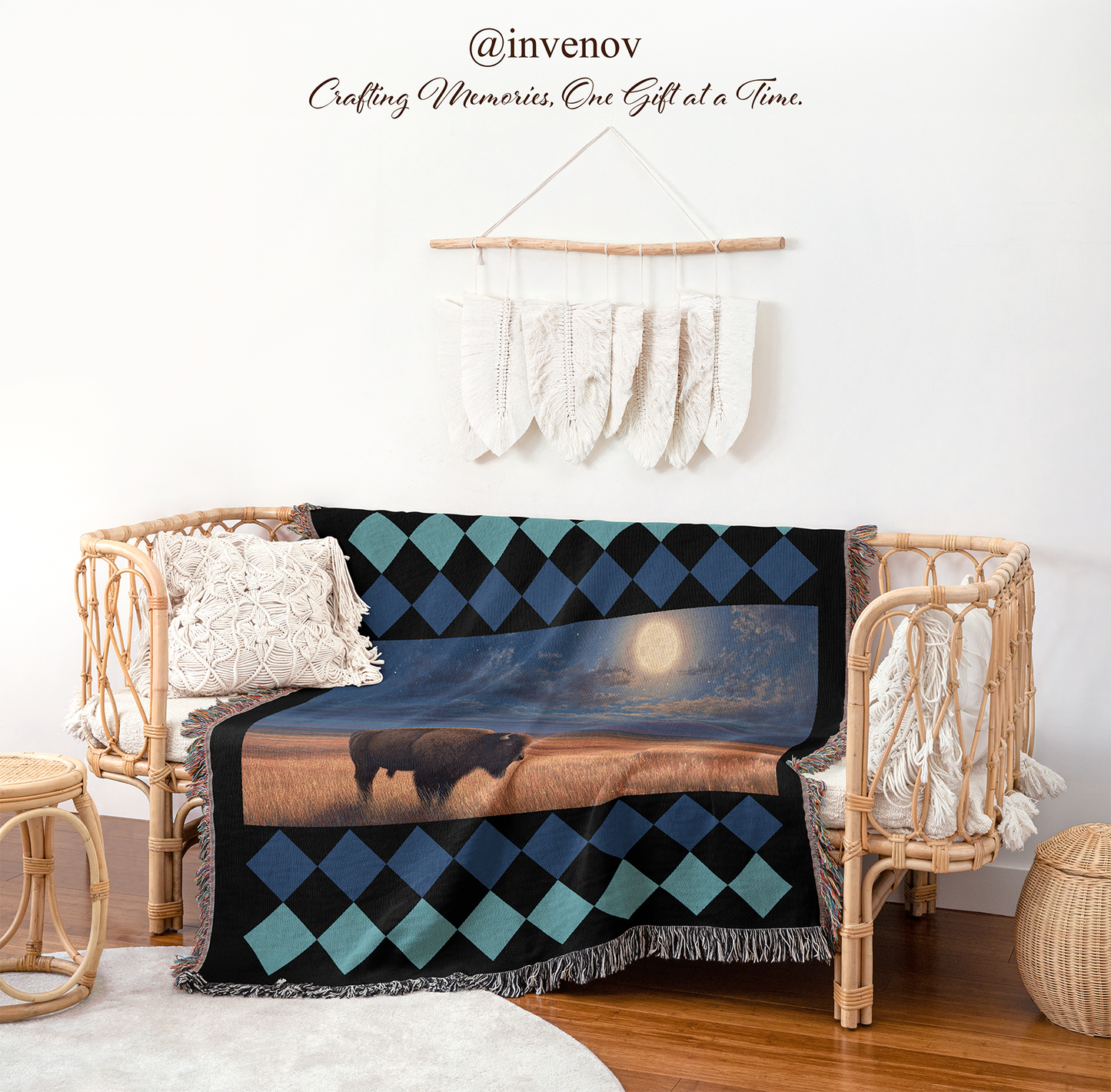 Decorative blanket with a buffalo design draped over a wicker chair