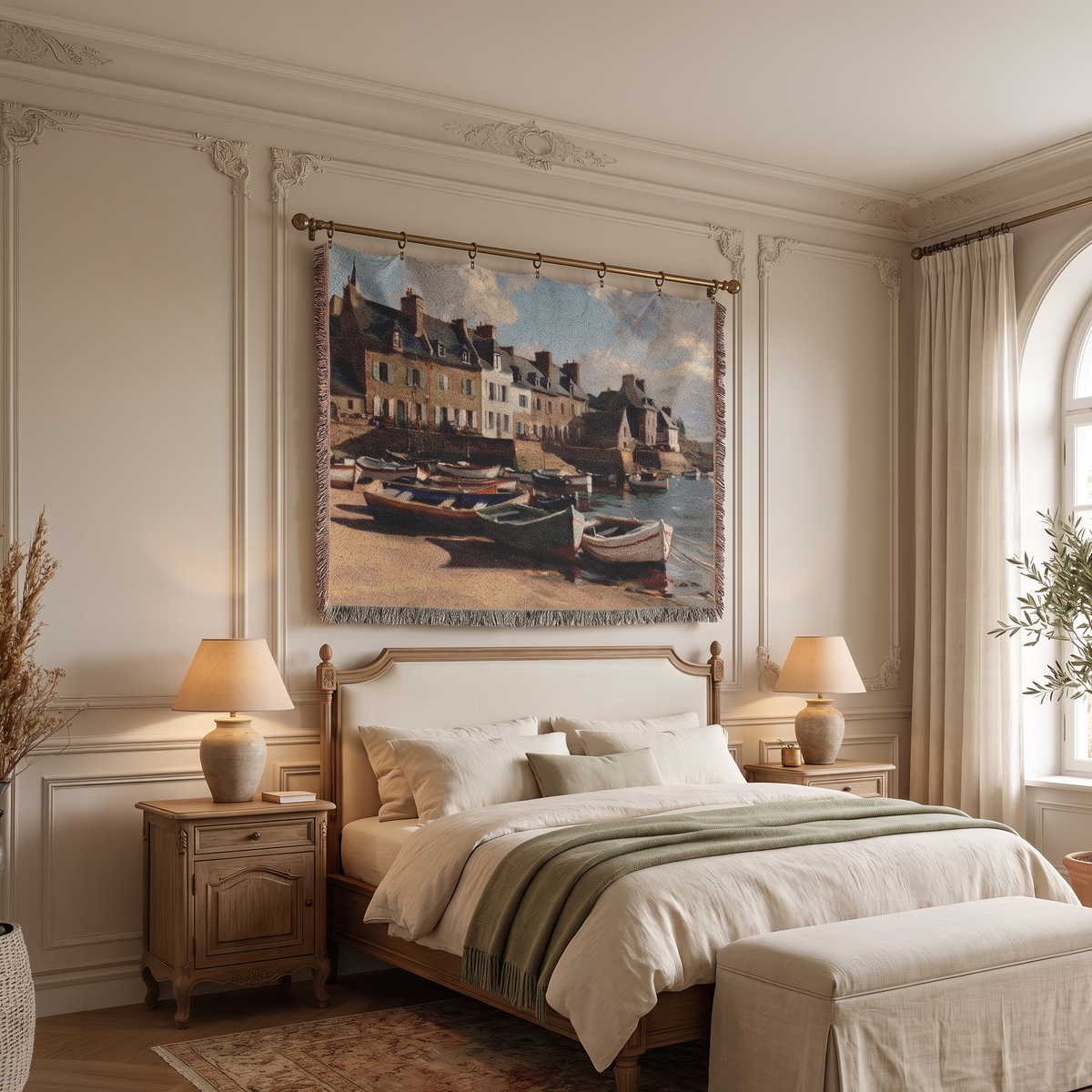 A large woven tapestry featuring a coastal harbor scene with boats and buildings, hung on a wall above a neatly made bed in a softly lit bedroom.
