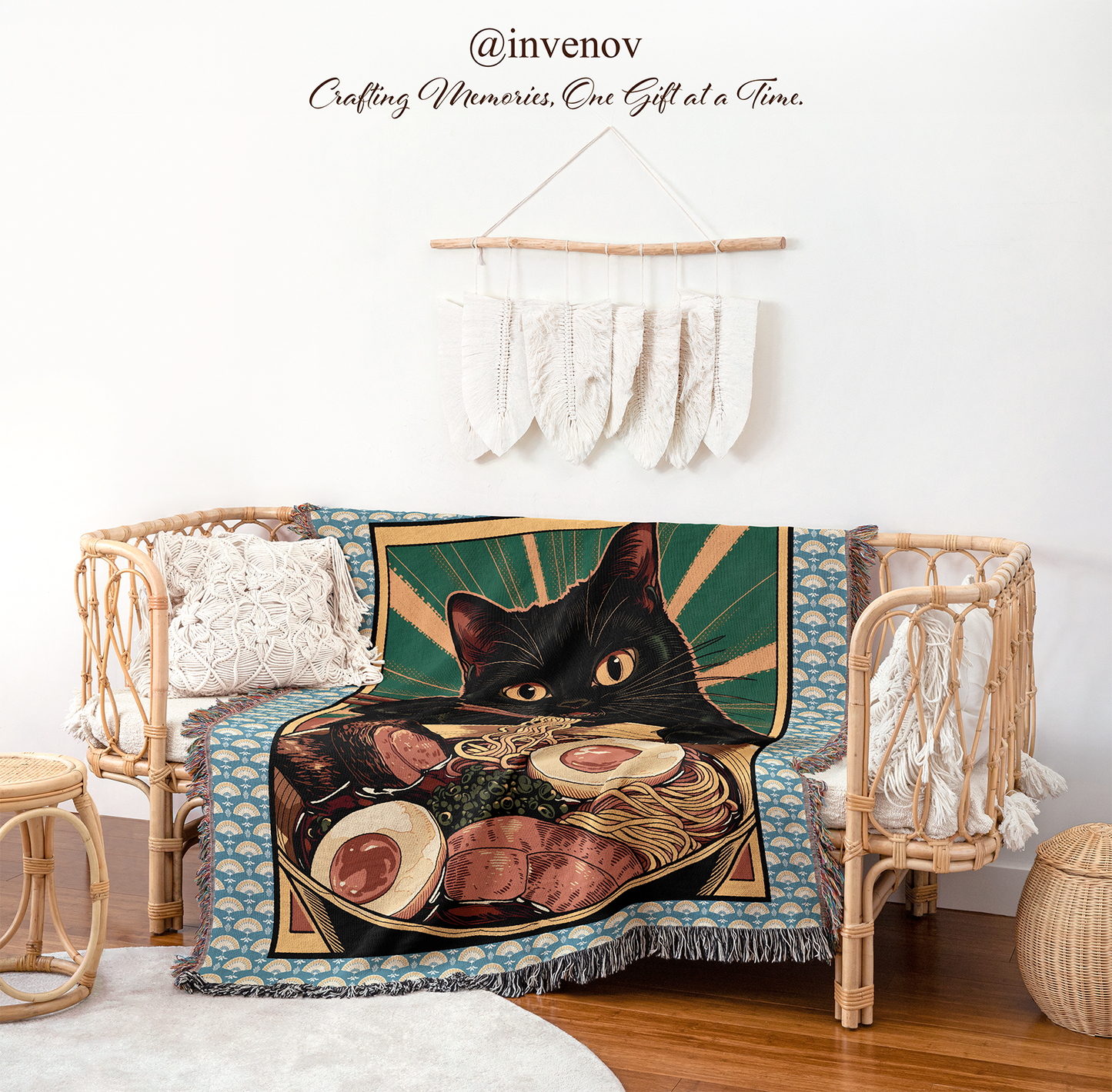 Decorative blanket with a cat design draped over a chair in a room setting.