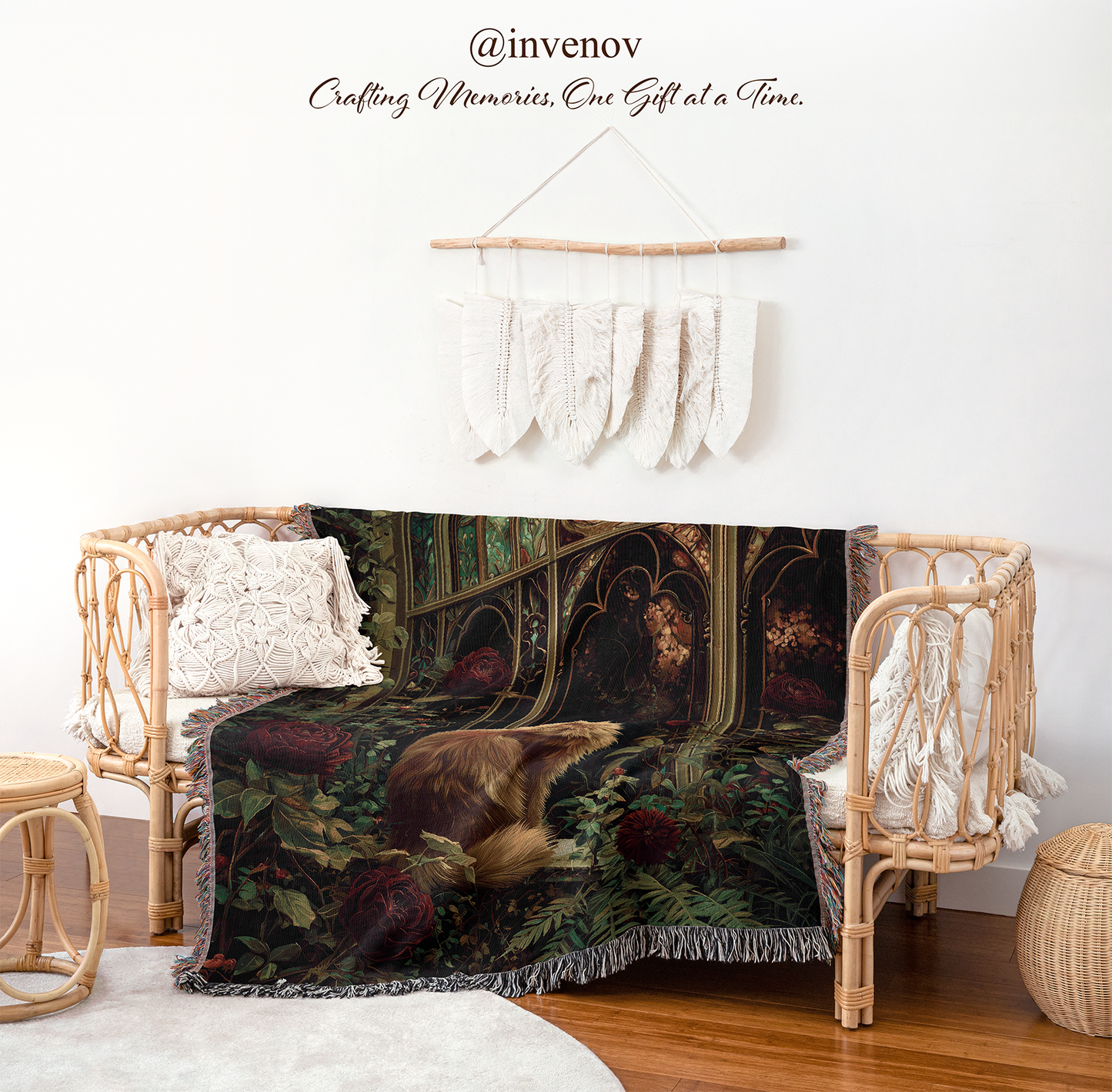 Decorative blanket with a cat design draped over a chair in a room setting.