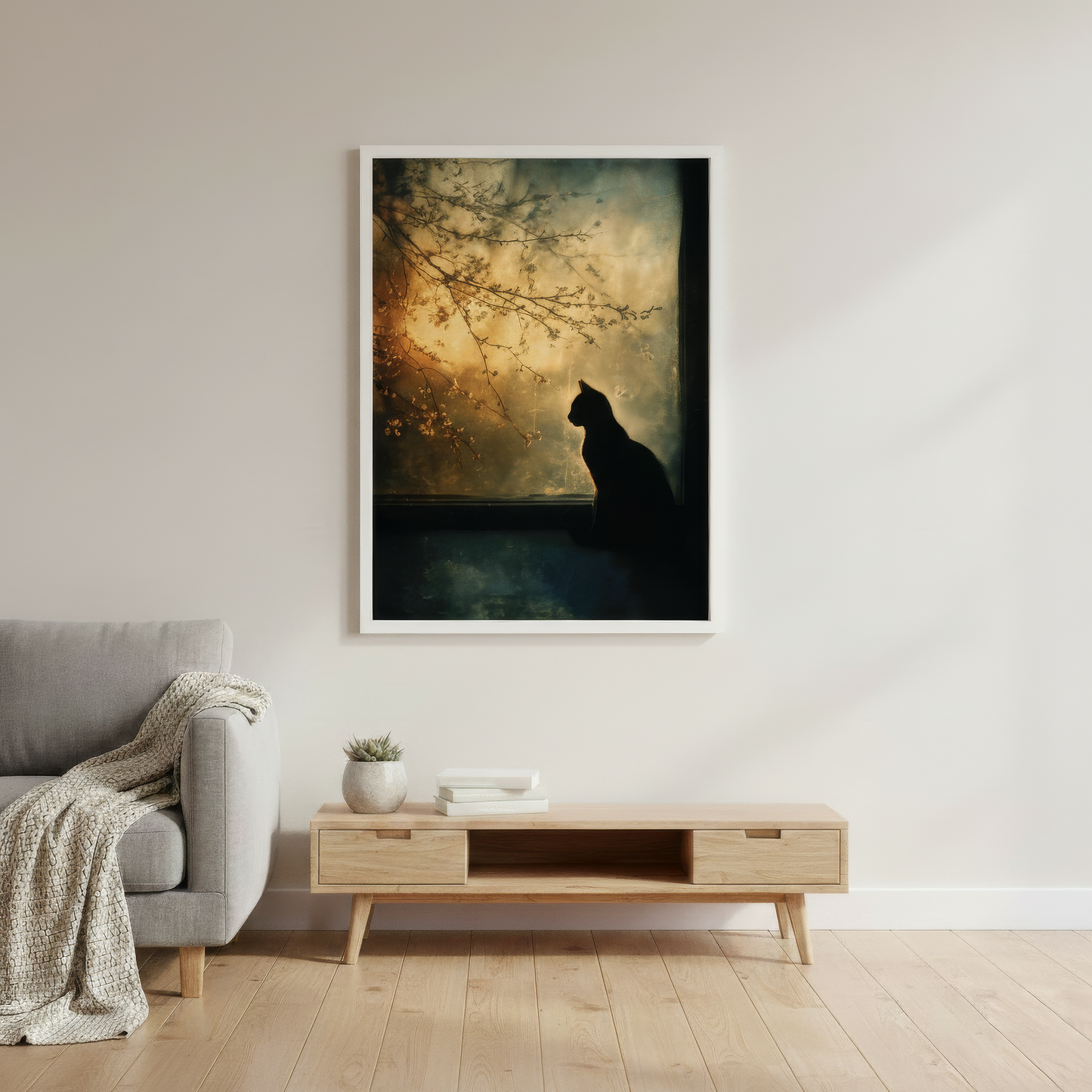 Framed artwork of a silhouette of a cat by a lake in a modern living room.