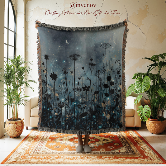 Decorative blanket with floral design in a room with plants and furniture.