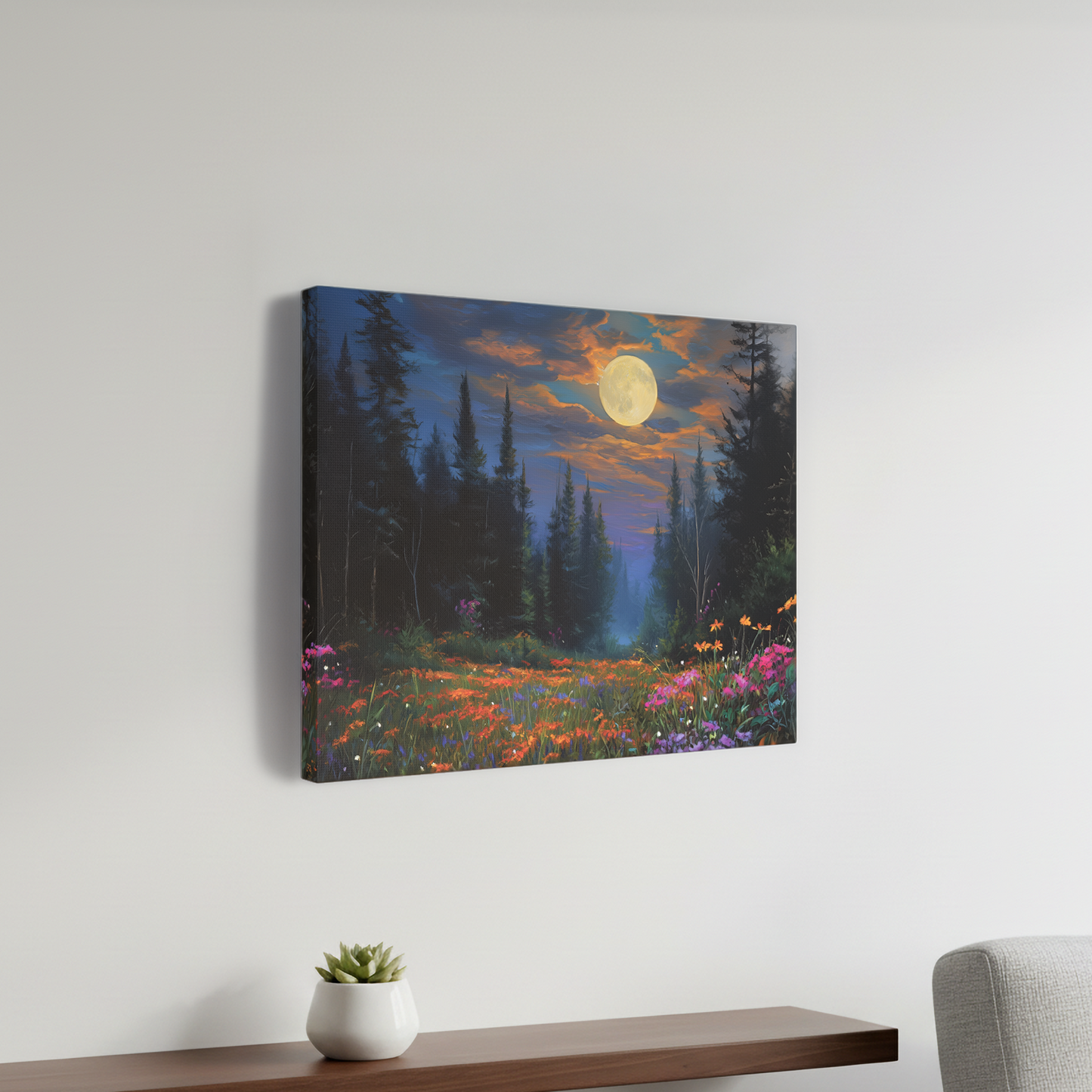 Canvas print of a forest scene with a moonlit sky hanging on a wall above a sofa and coffee table.