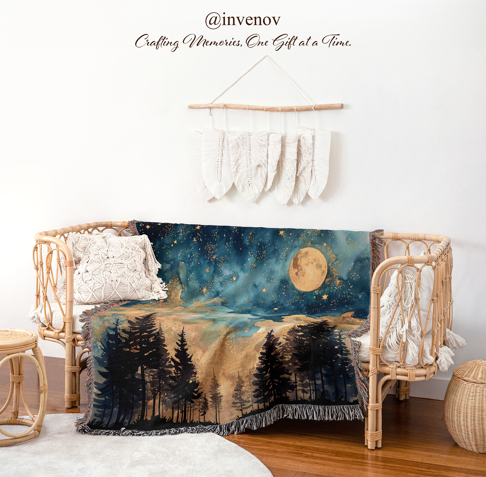 Decorative blanket with forest and moon design draped over a chair