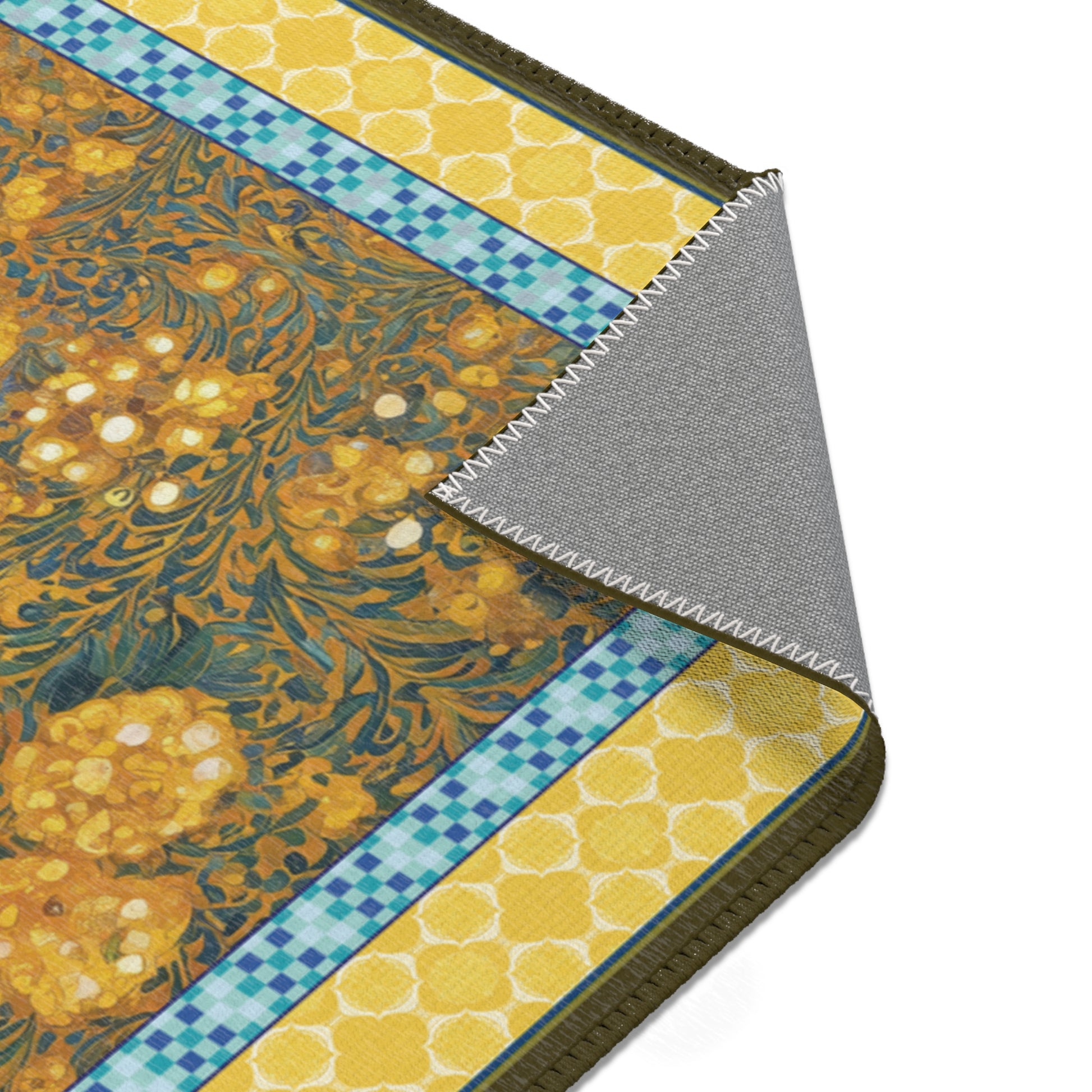 Close-up of an rug with floral and geometric patterns.