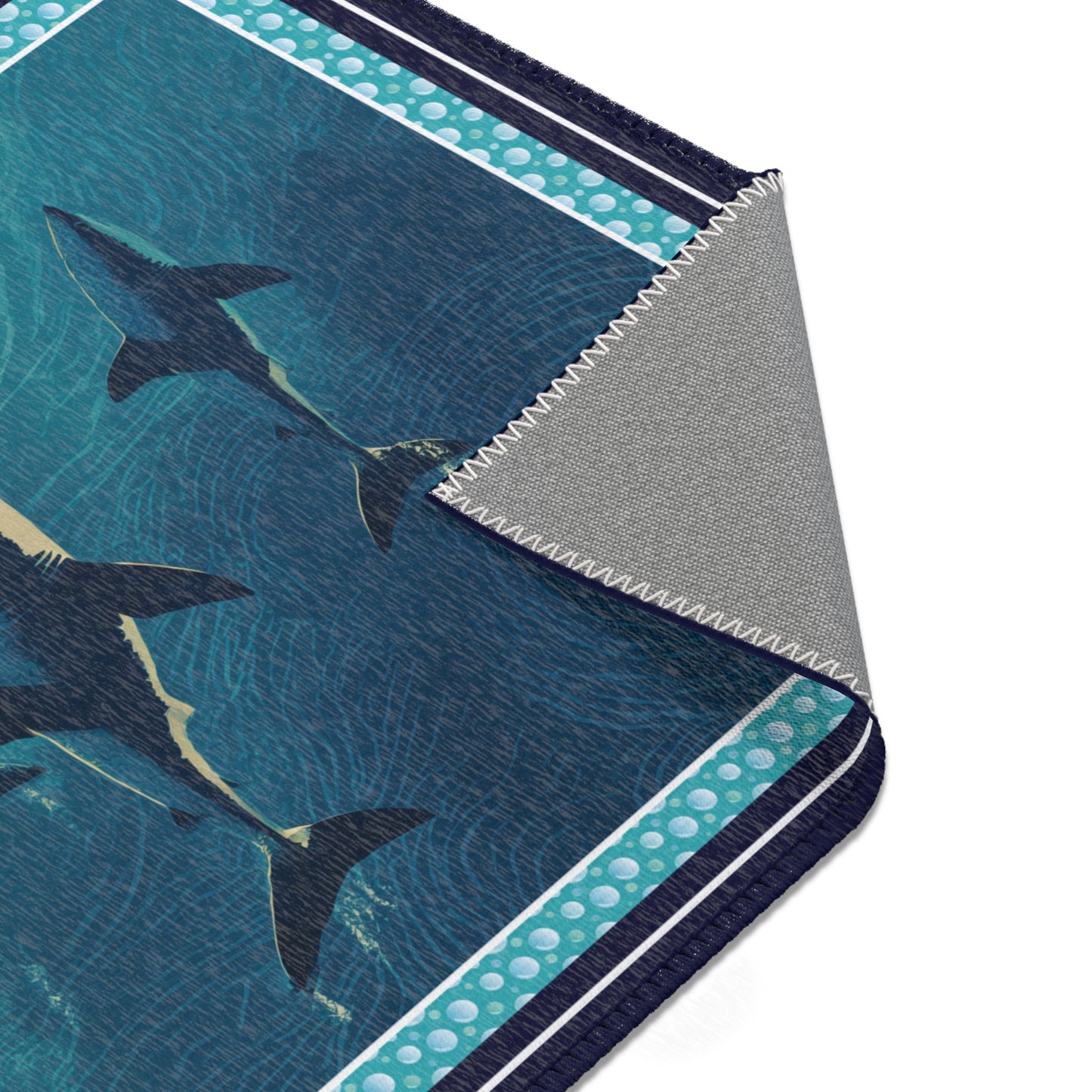 area rug with shark pattern and gradient colors on a white background