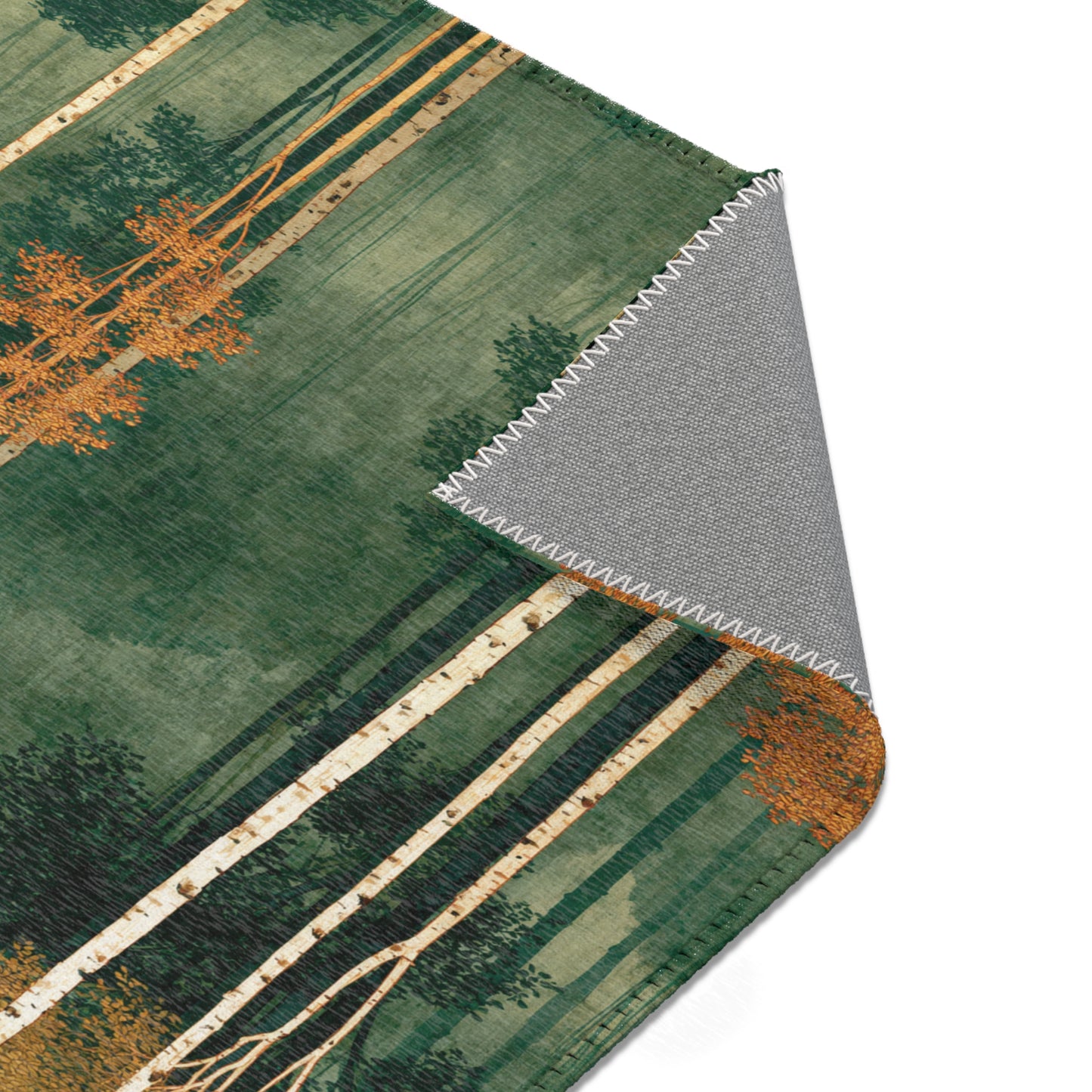 Close-up of a rug with nature-themed design on a white background