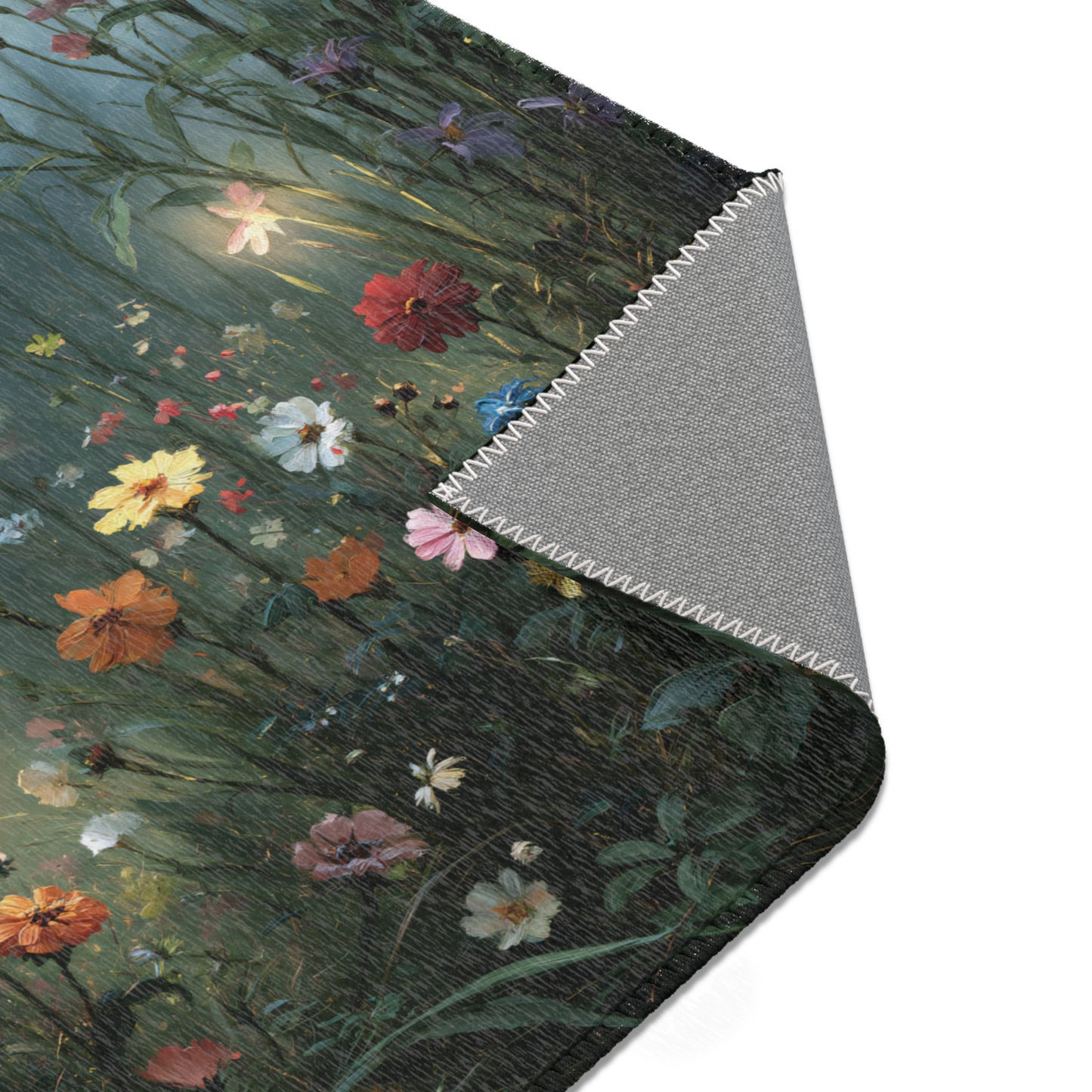 Floral patterned area rug with a gray backing