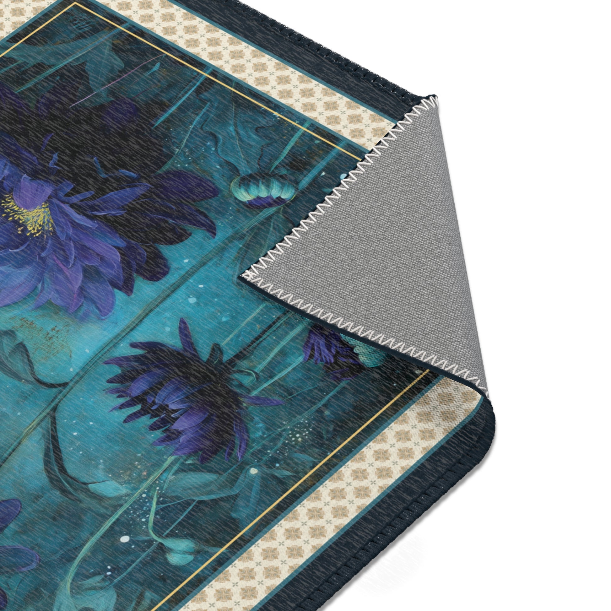 close up of an area rug with dark floral graphic