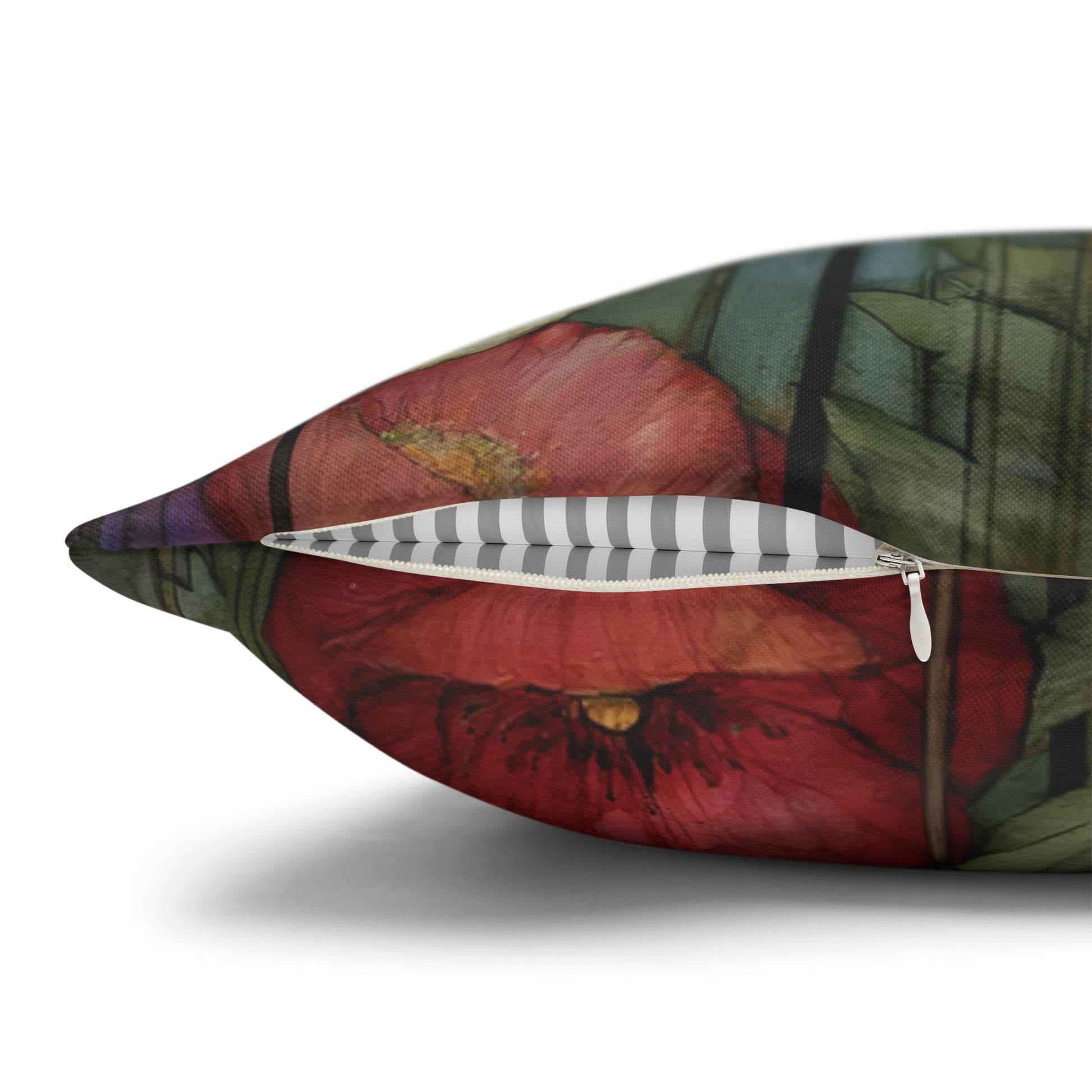 Decorative pillow with a floral design and zipper on a white background