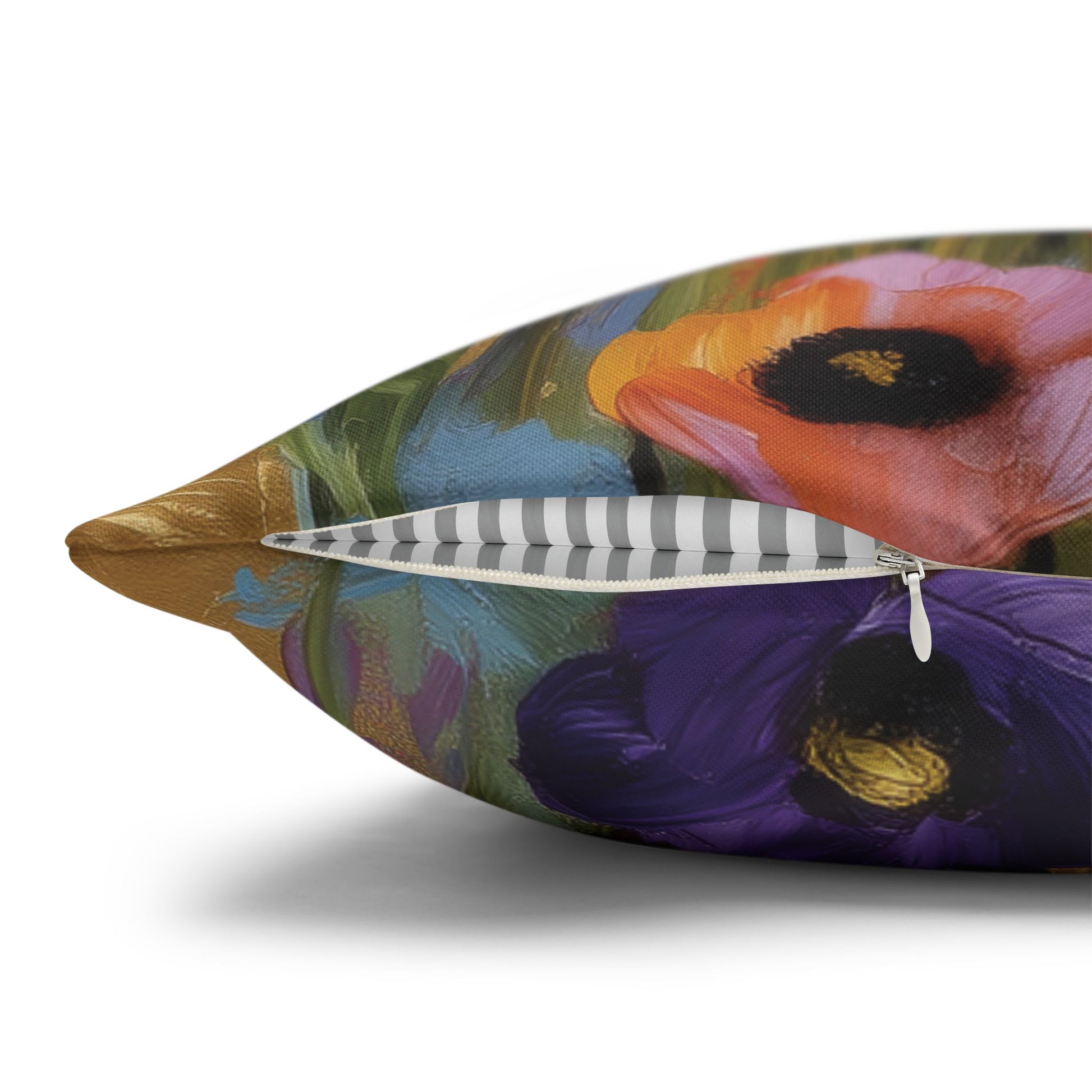 Decorative pillow with colorful floral design on a white background