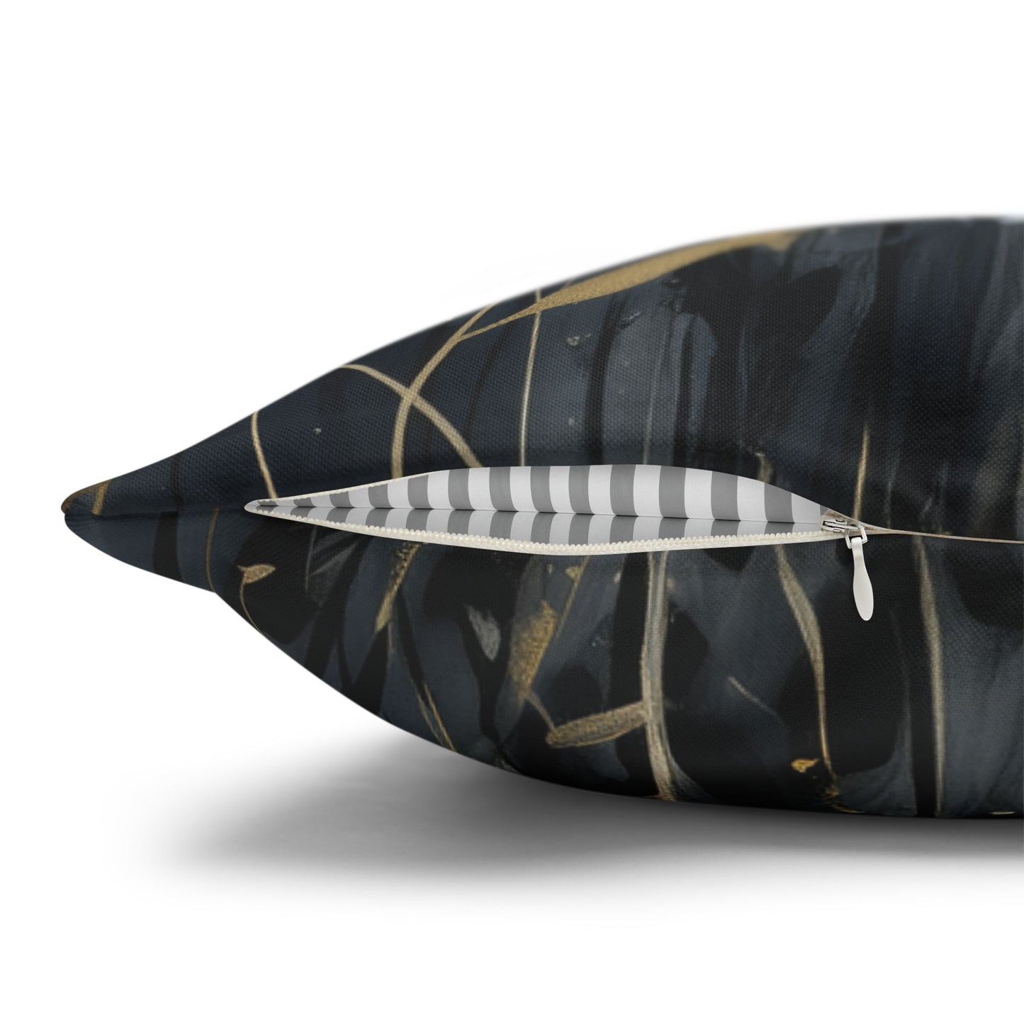 Decorative pillow with leaf design on a white background