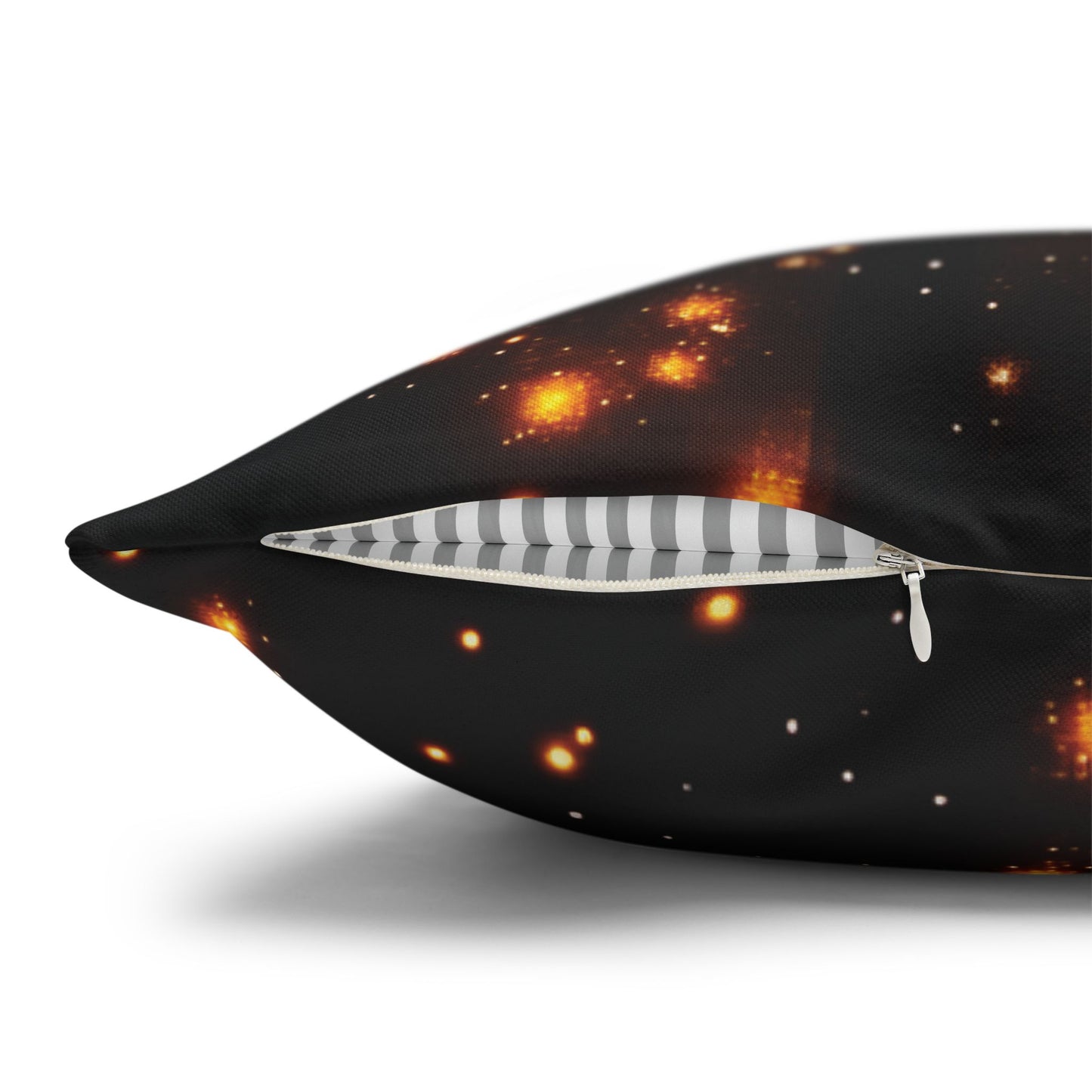 Decorative pillow with space-themed design featuring stars and a zipper on a white background