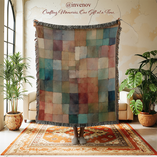 Colorful patchwork blanket in a room with plants and a rug.