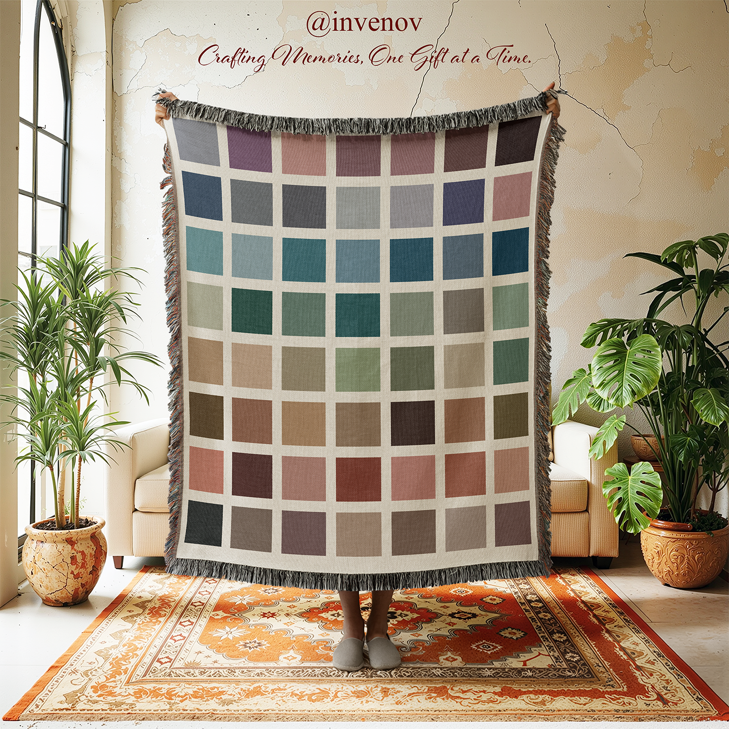 Color swatch blanket displayed in a room with plants and furniture.