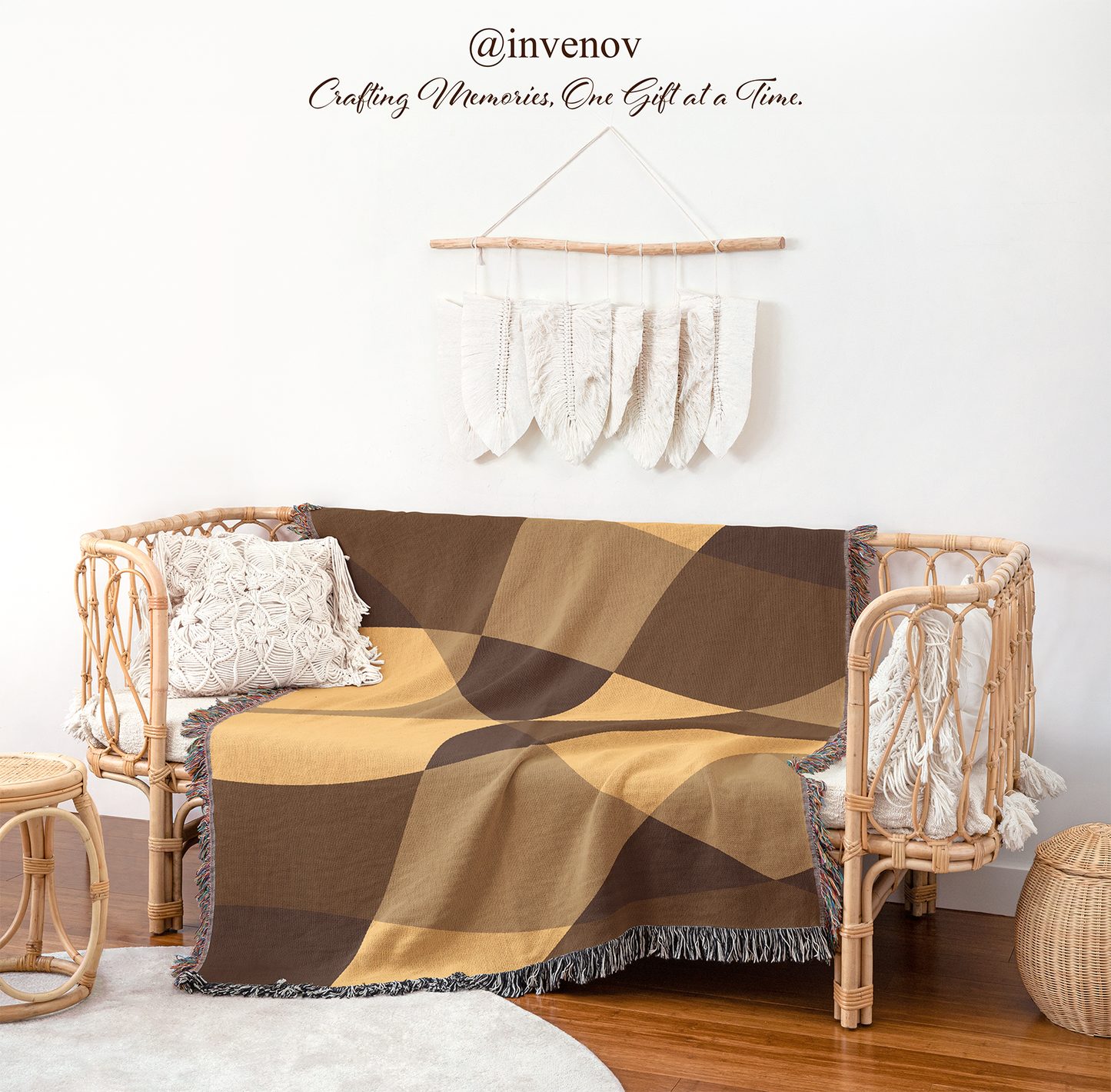 Geometric patterned throw blanket draped over a wicker chair