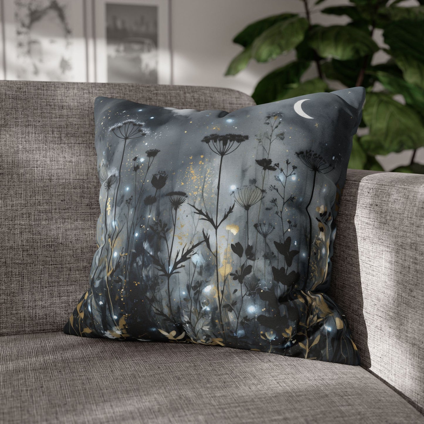 Decorative pillow with floral design on a gray sofa