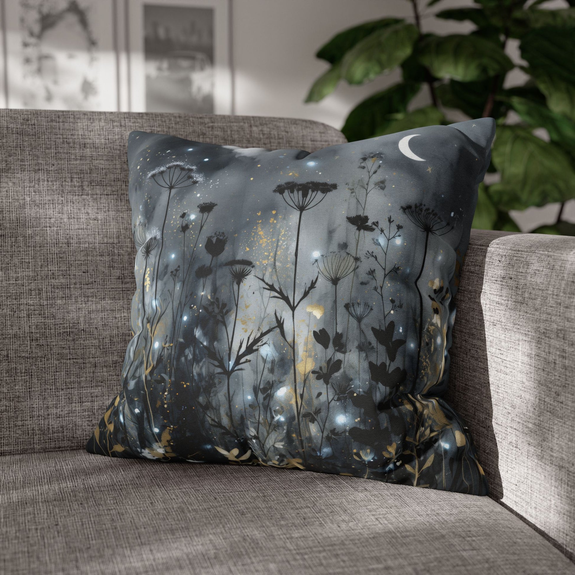 Decorative pillow with floral design on a gray sofa