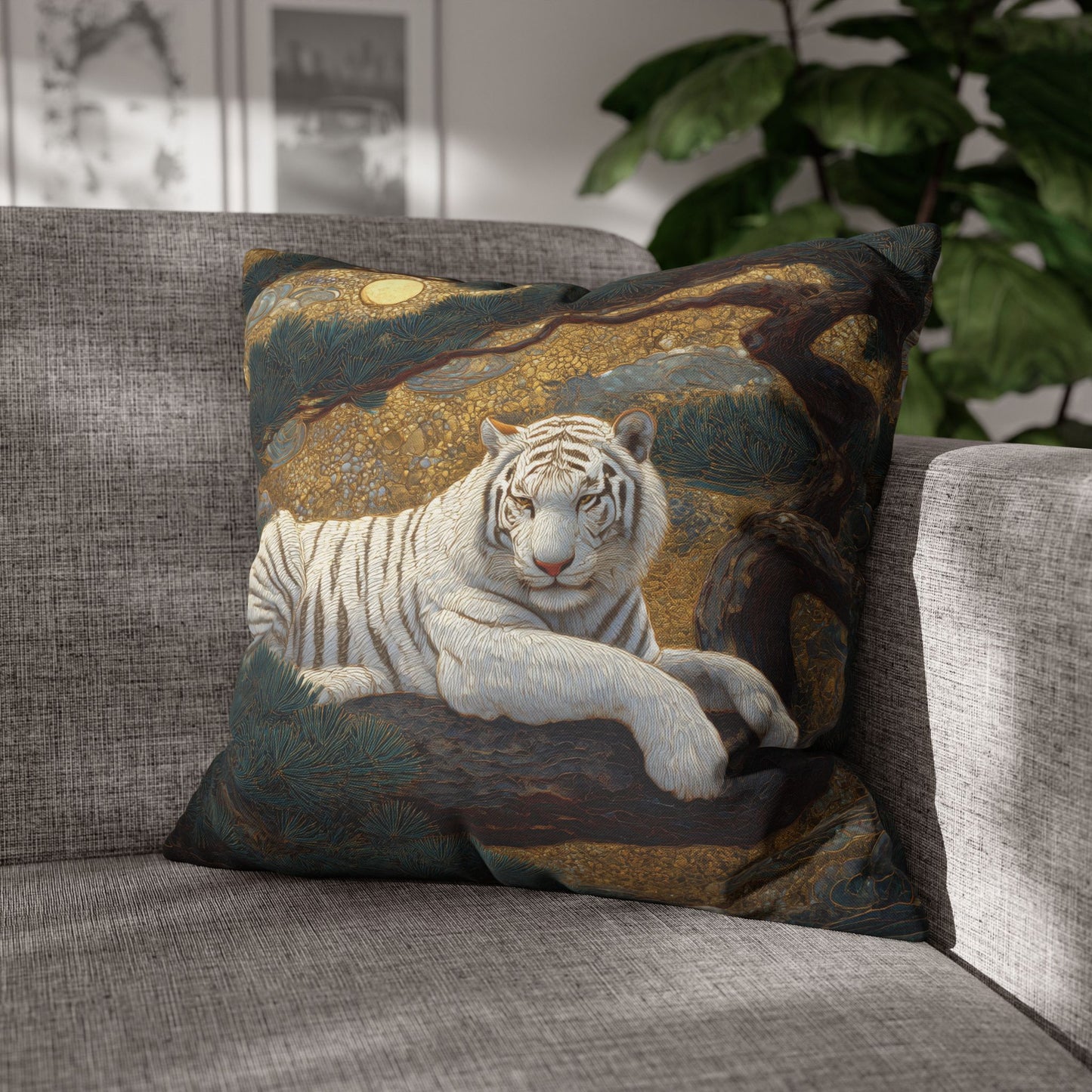 Decorative pillow with a white tiger design on a gray sofa.