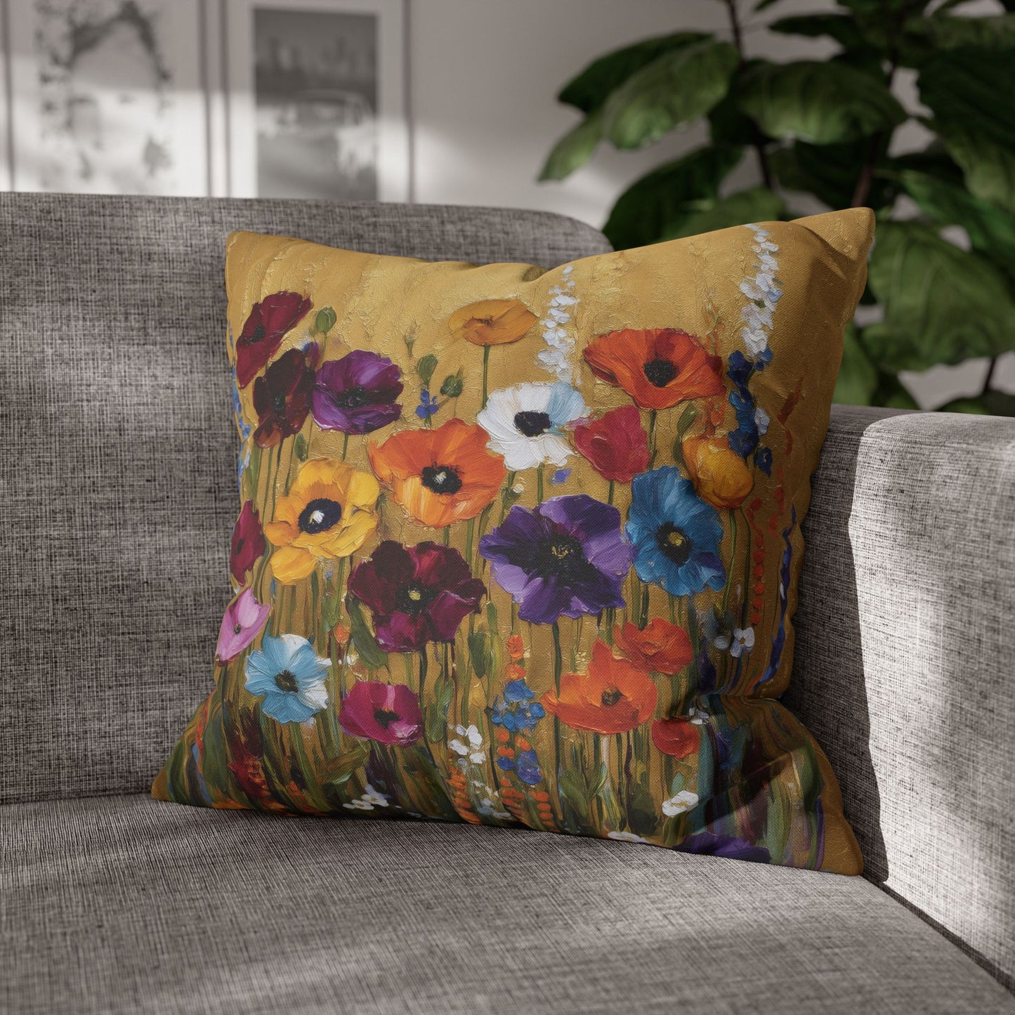 Decorative pillow with floral design on a gray sofa