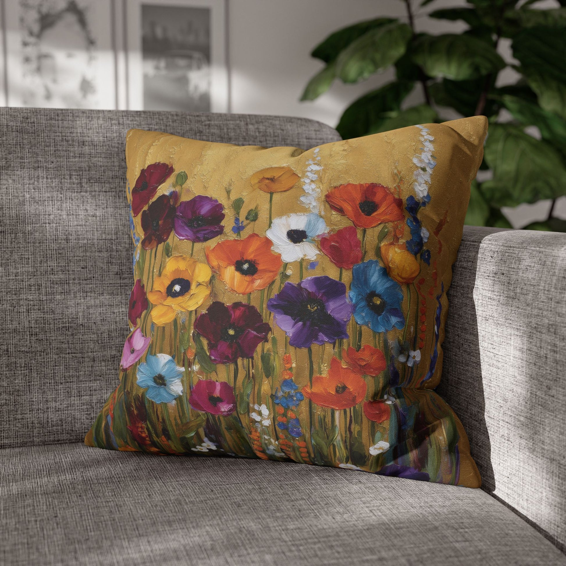Decorative pillow with floral design on a gray sofa