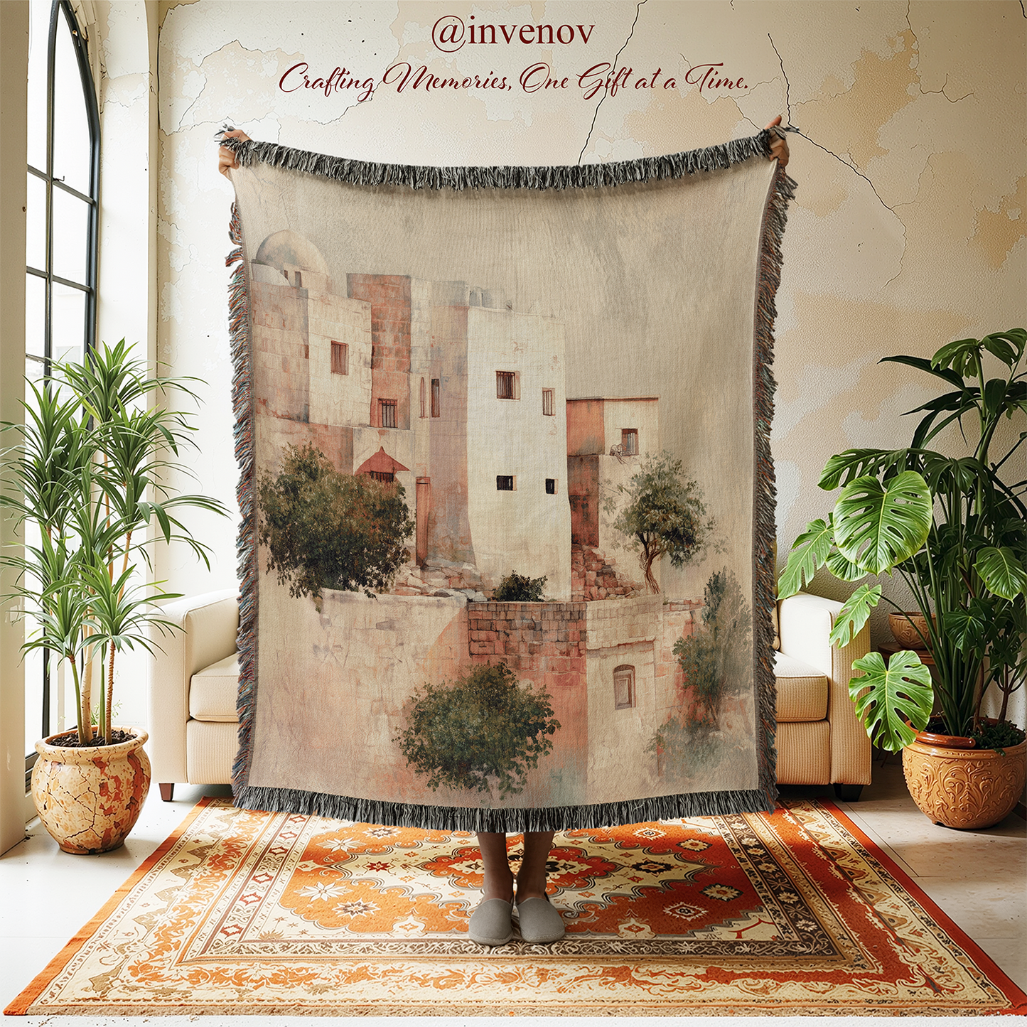 Decorative tapestry with architectural design in a room with plants and furniture.