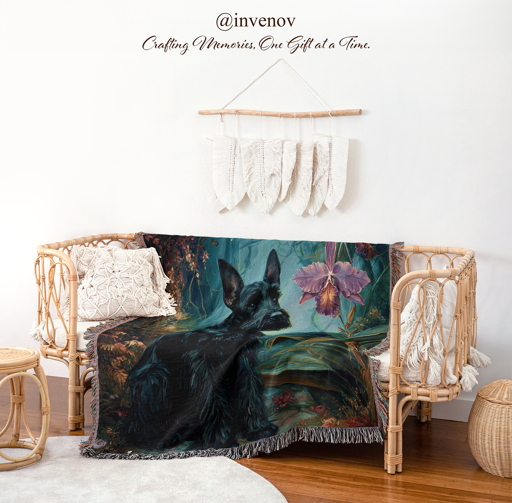 Decorative blanket with a black dog design draped over a chair