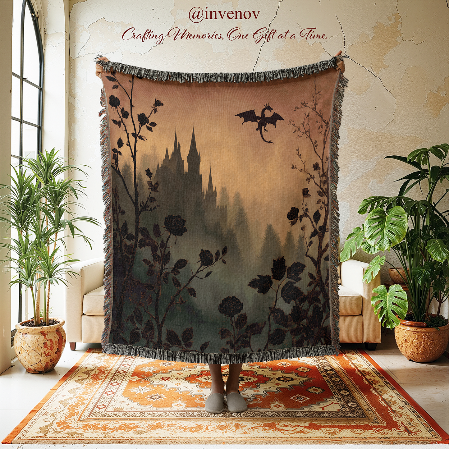Decorative blanket with castle and dragon design draped over a person in a room with plants and a rug.