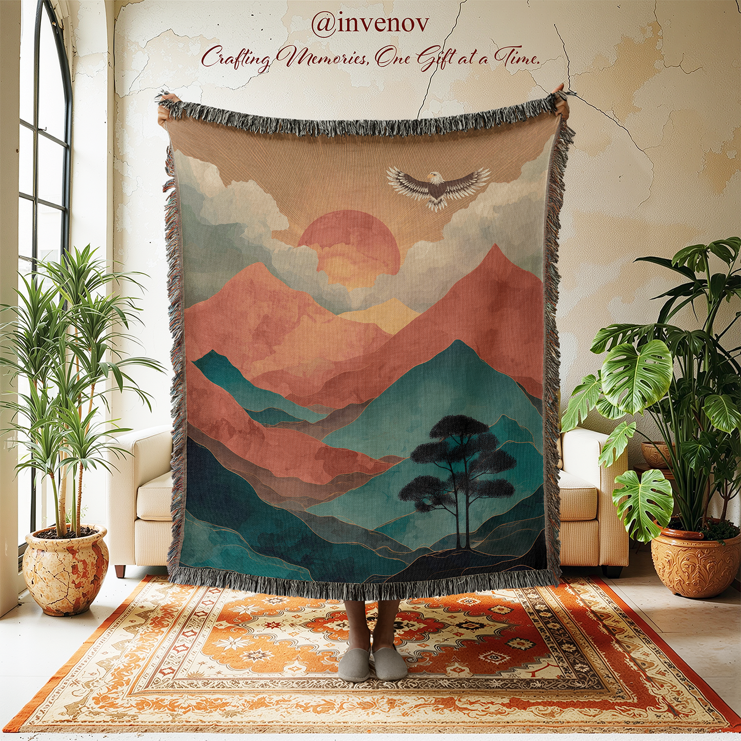 Decorative tapestry with mountain and sunset design in a room with plants and furniture.