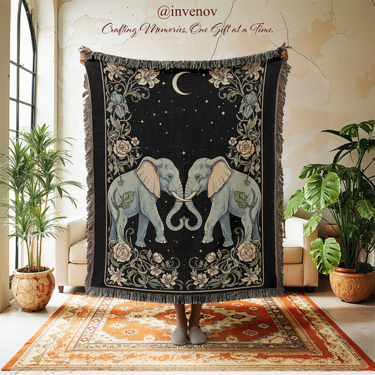Decorative throw blanket with elephant design held by a person in a room with plants and furniture.