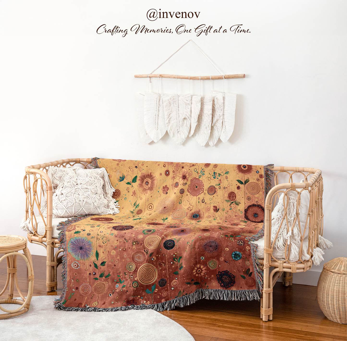 Floral patterned throw blanket draped over a wicker chair 