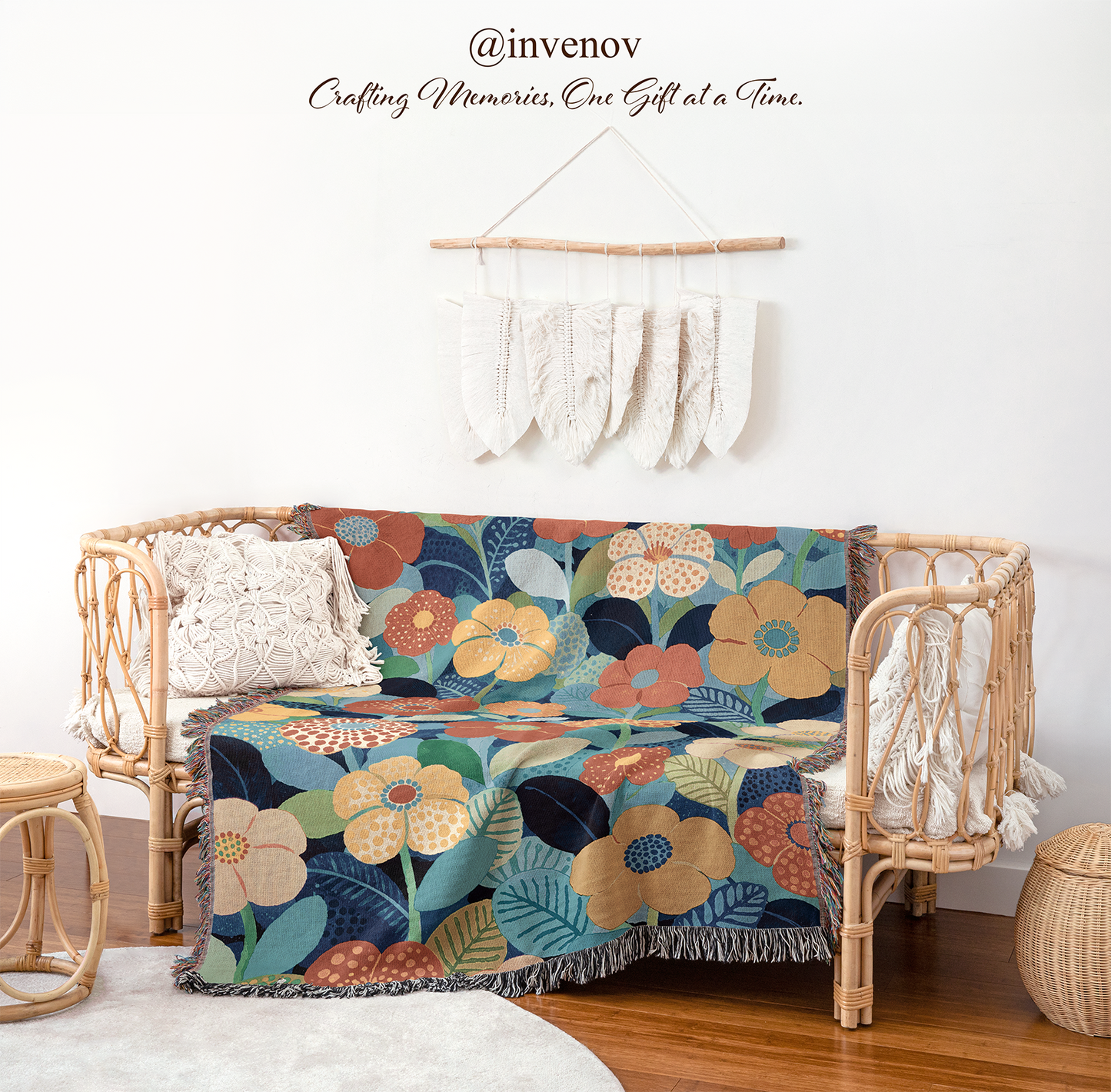 Floral-patterned throw blanket draped over a wicker chair 