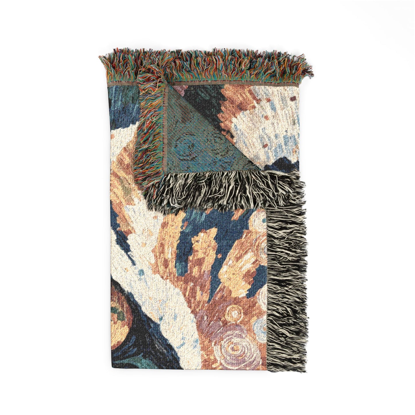Multicolored woven blanket with fringe on a white background