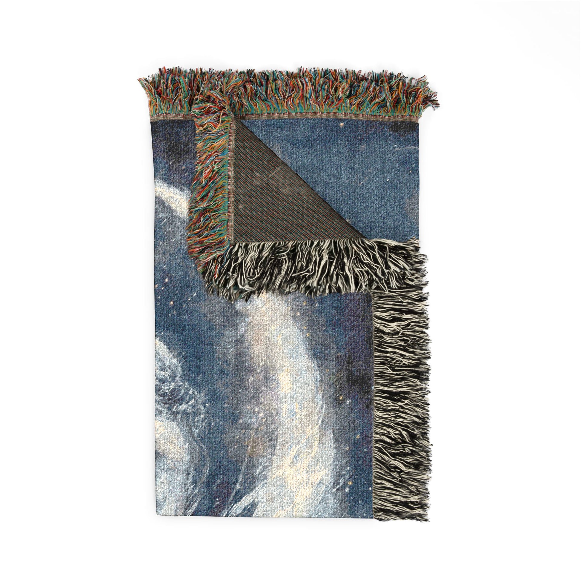 blanket with fringed edges and abstract design on a white background