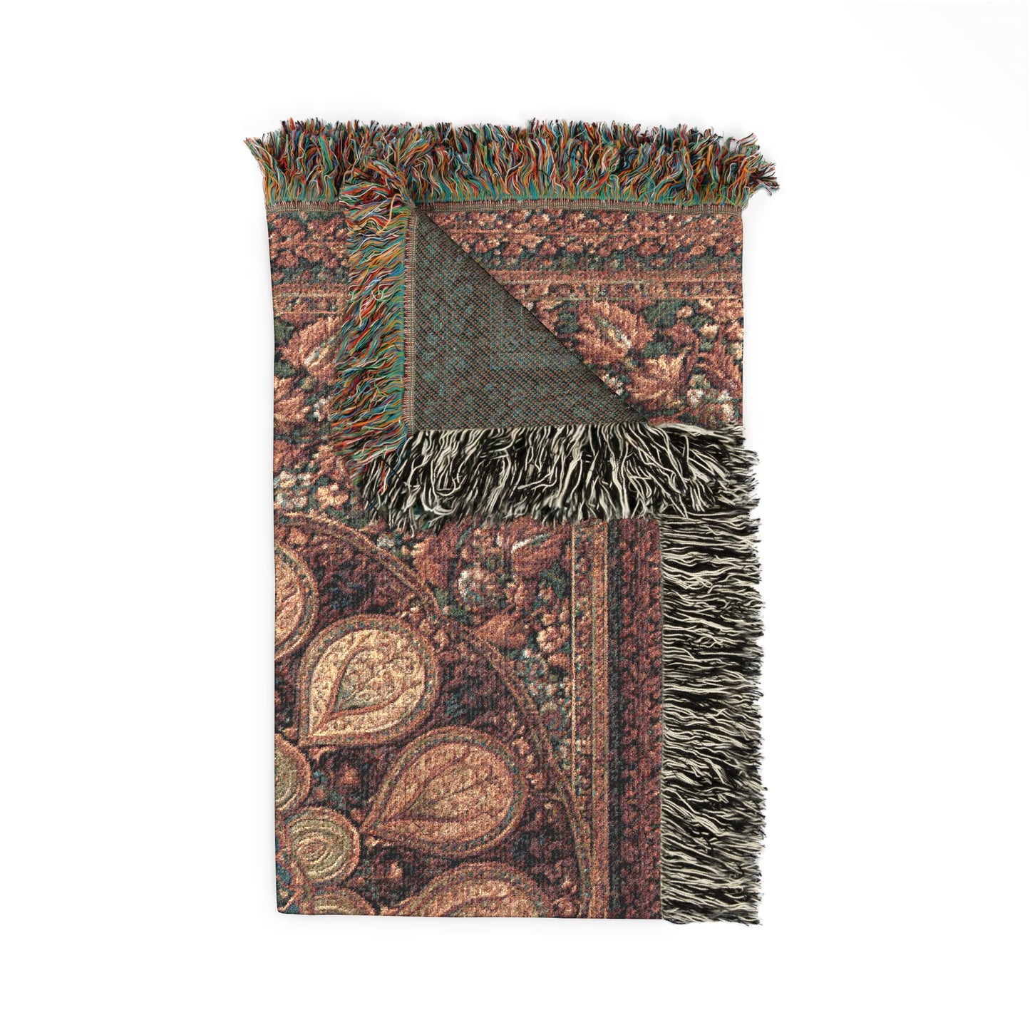 Decorative throw blanket with intricate patterns and fringes on a white background