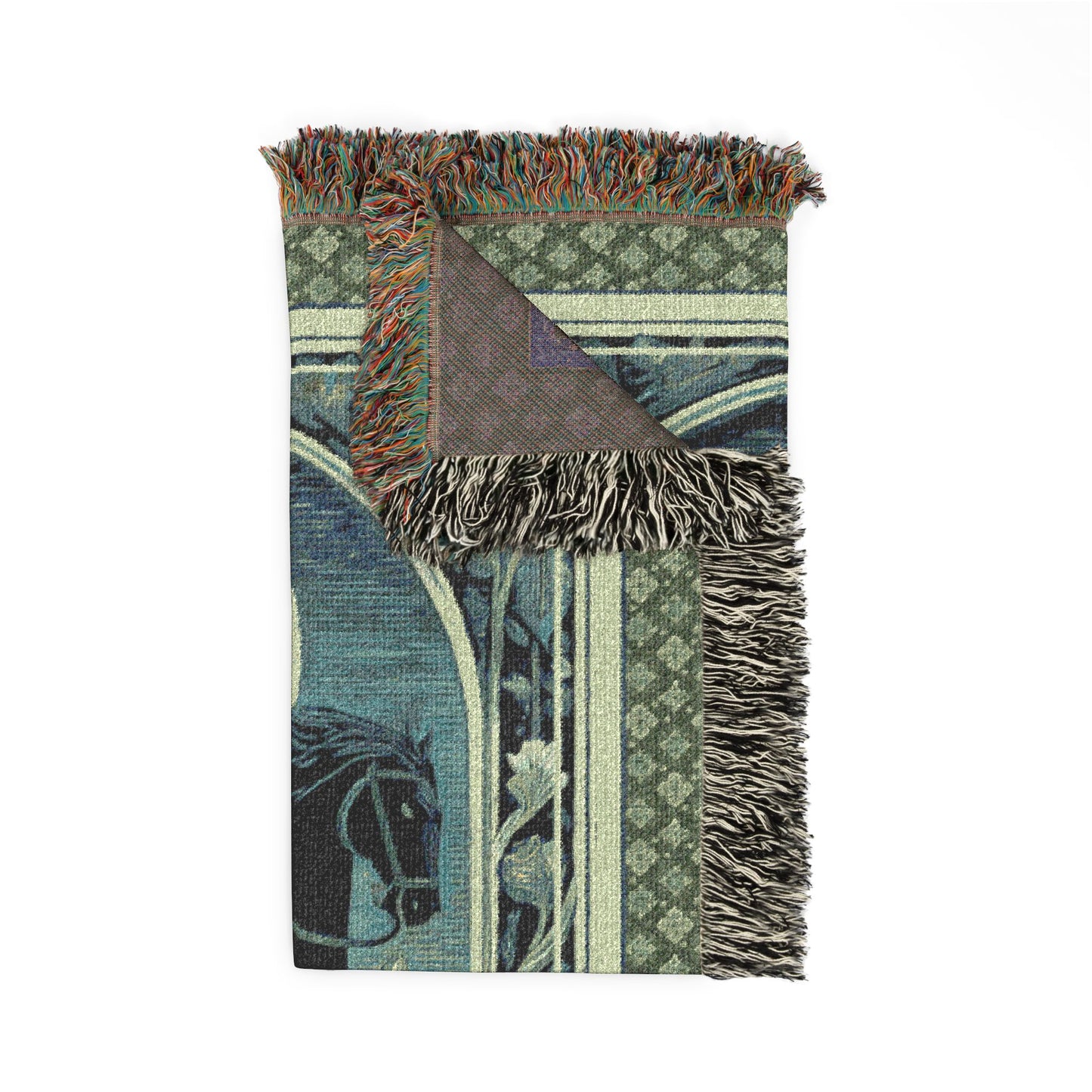 Decorative blanket with intricate patterns and fringes on a white background