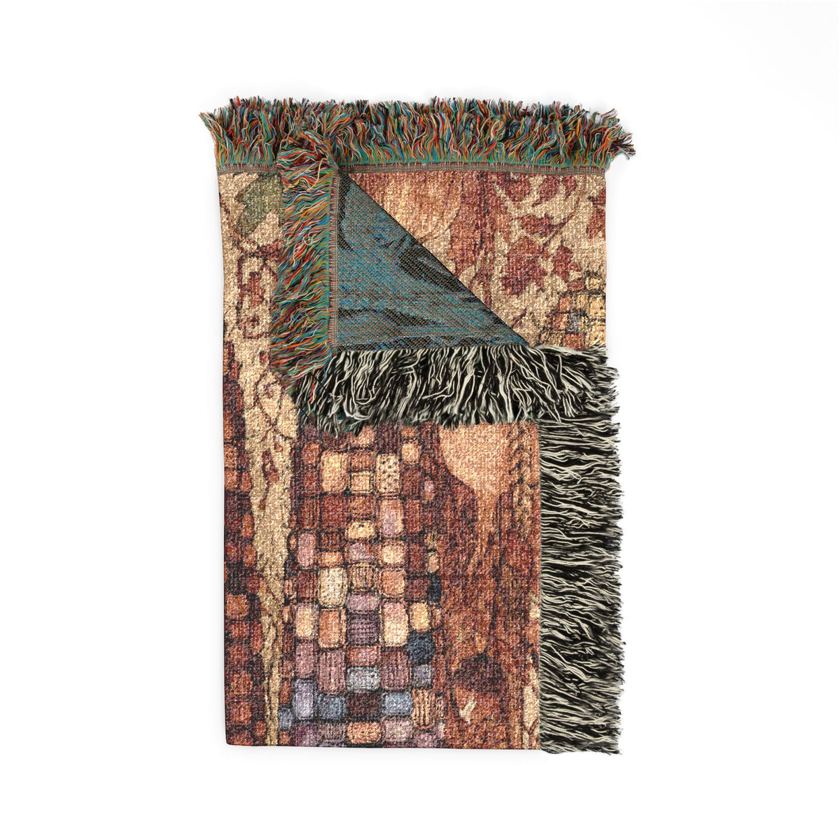 A rectangular woven throw blanket with fringed edges, featuring an abstract geometric pattern in earthy tones of brown, beige, teal, and muted blue, shown against a plain white background.