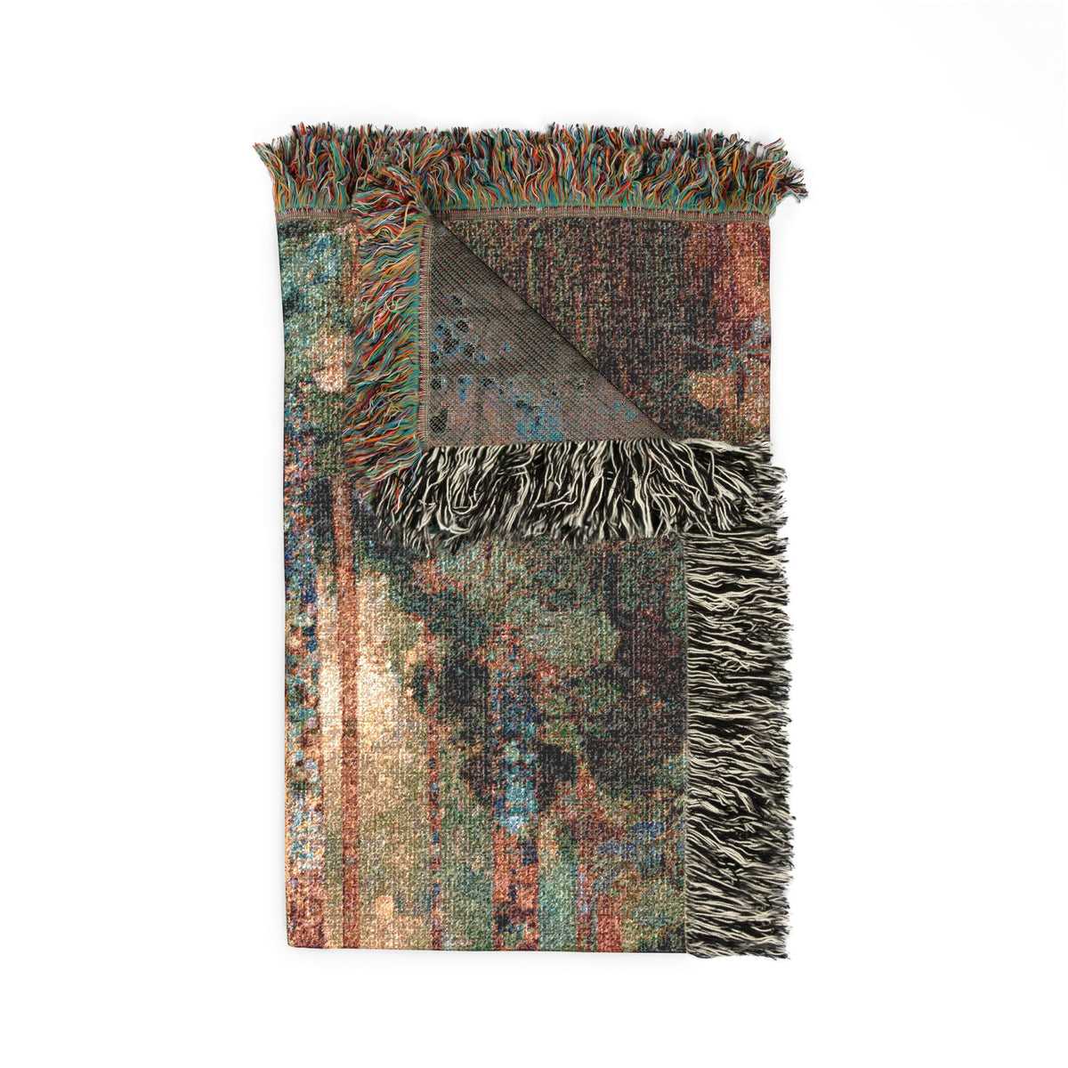 A folded multicolor patterned throw blanket with fringed edges, shown on a plain white background.