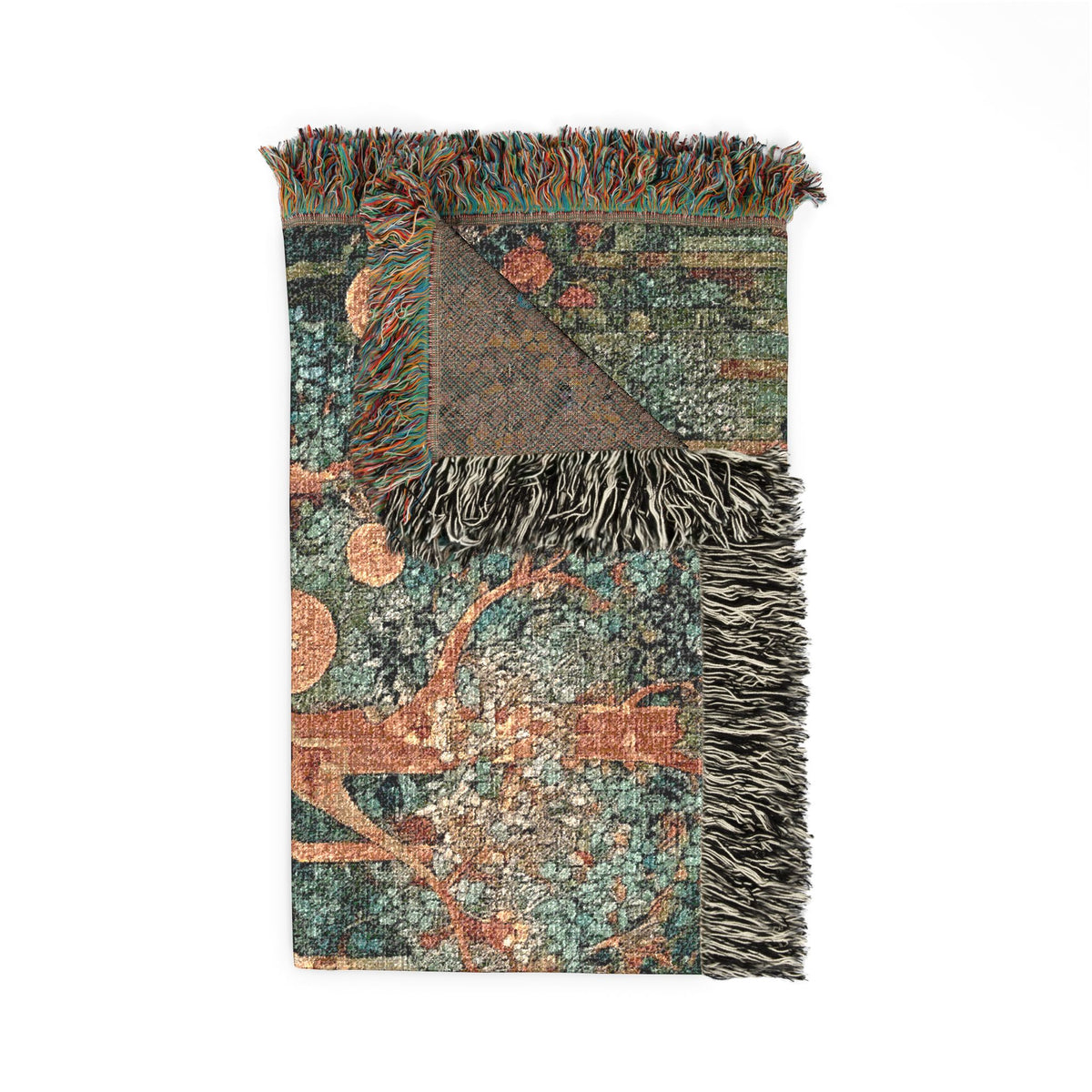 A rectangular woven throw blanket with fringed edges, featuring an abstract botanical pattern in teal, green, rust orange, and brown tones, with one corner folded over to show the reverse side.