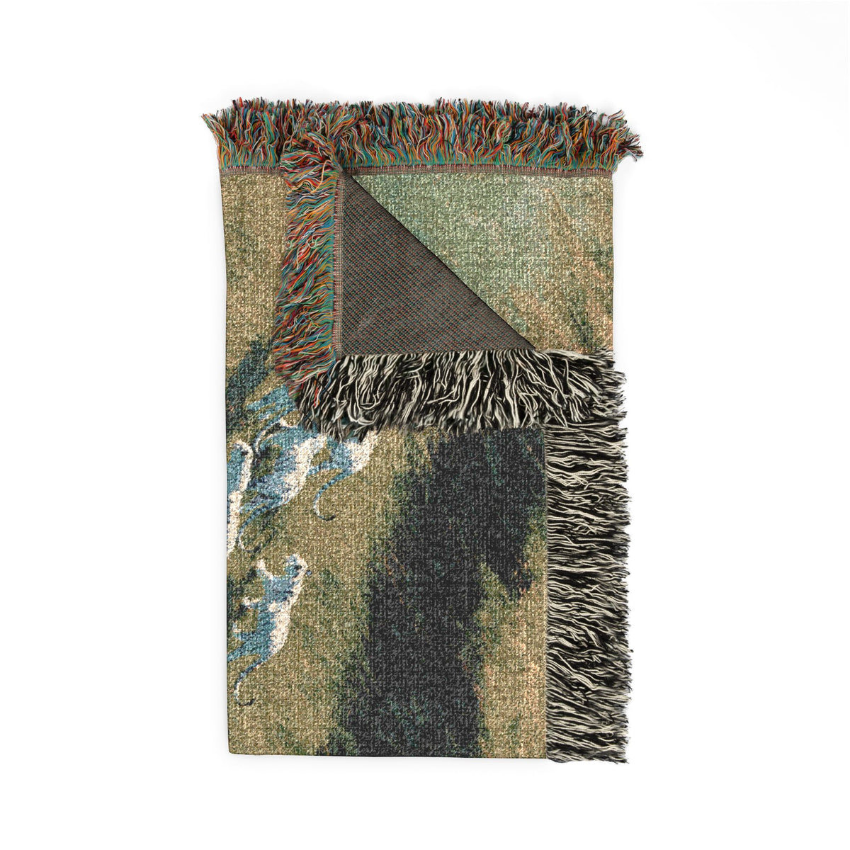 A rectangular woven throw blanket with fringed edges, shown on a plain white background. The top half is visible from the front, featuring a textured abstract pattern in beige, green, blue, and black, with multicolored fringe.