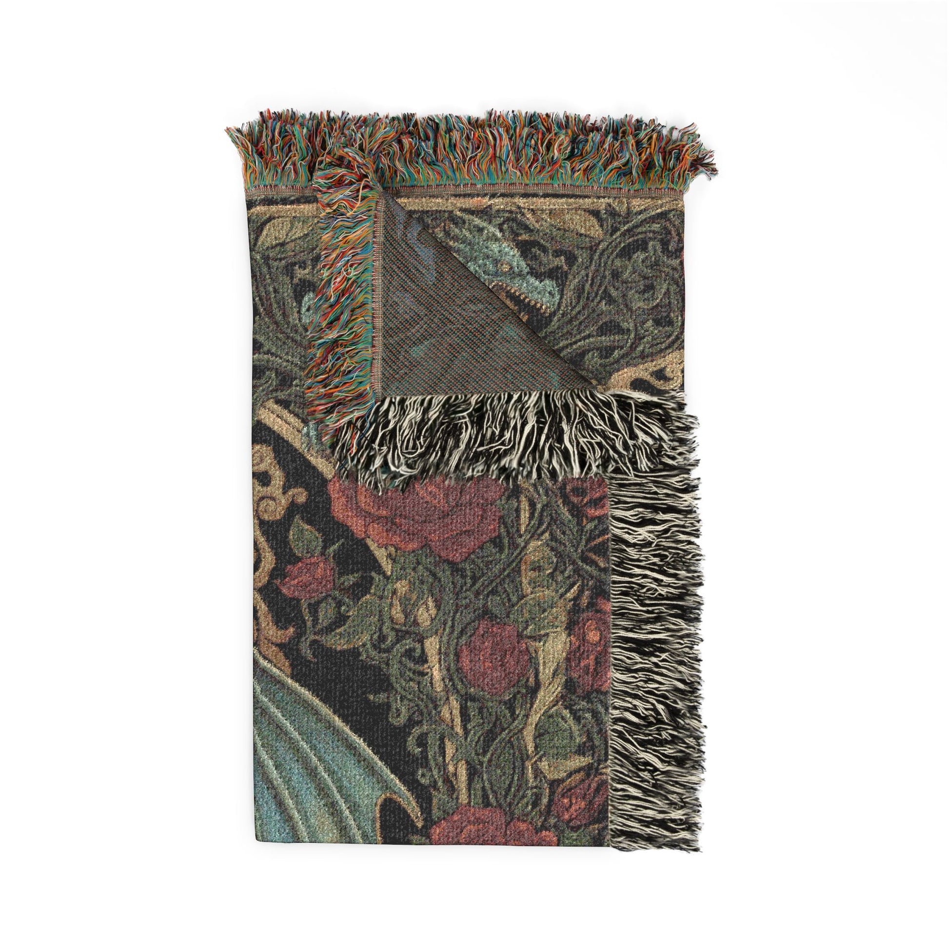 Decorative throw blanket with floral pattern and fringes on a white background