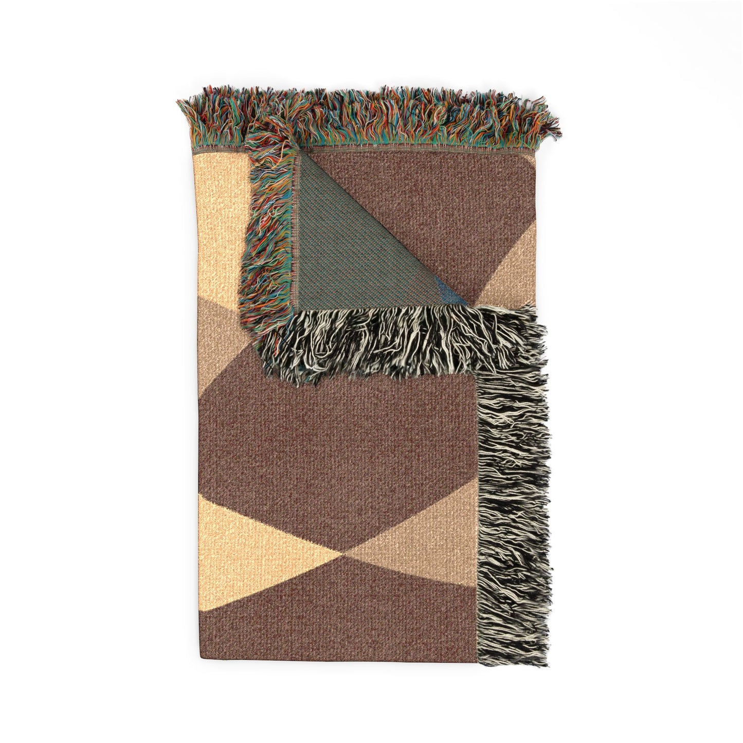 Geometric patterned blanket with fringes on a white background