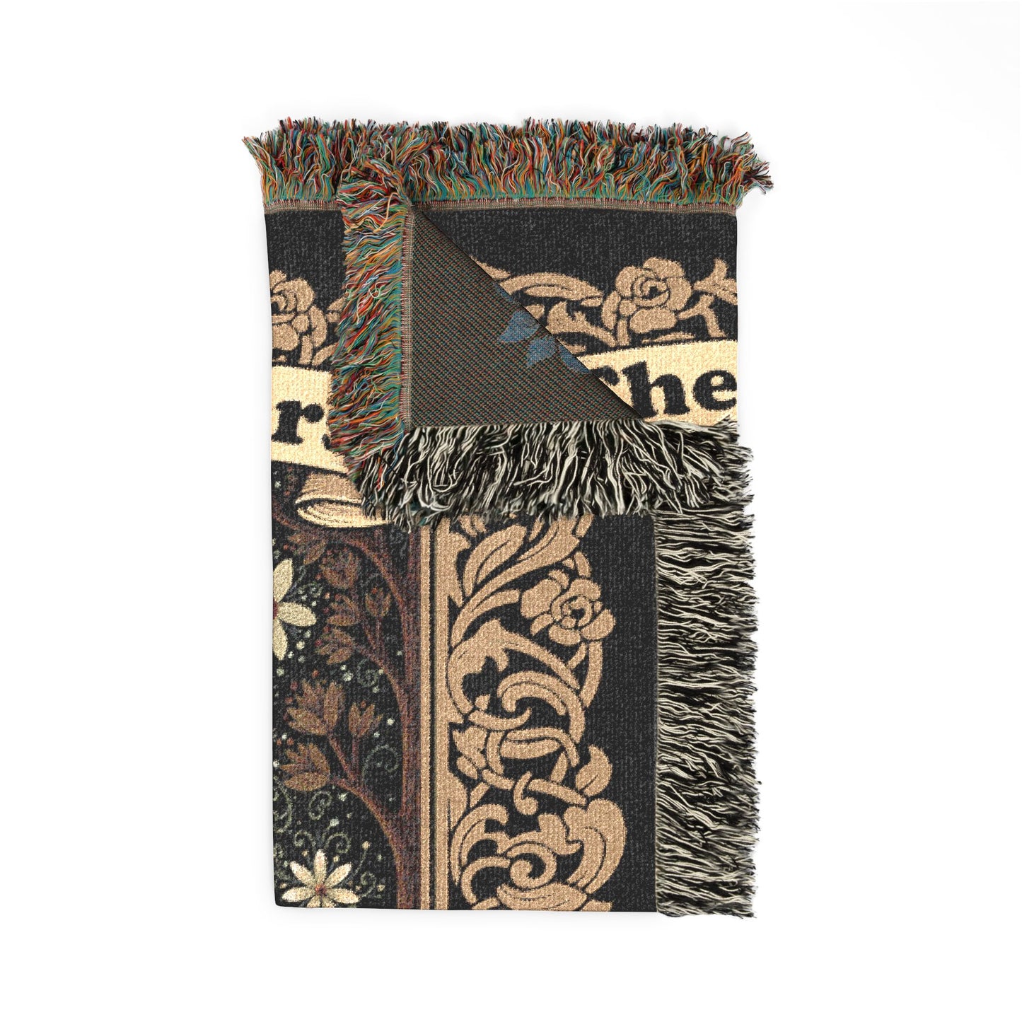 Decorative throw blanket with floral and text pattern on a white background