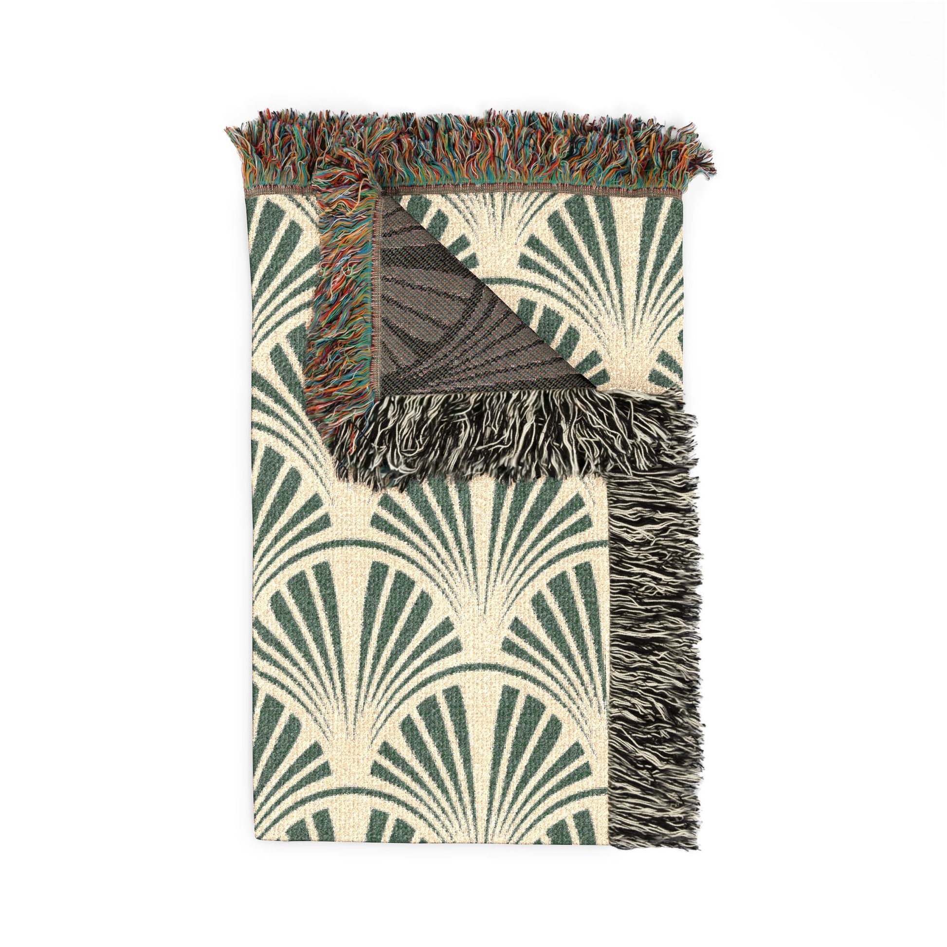 blanket with abstract pattern and fringed edge on a white background