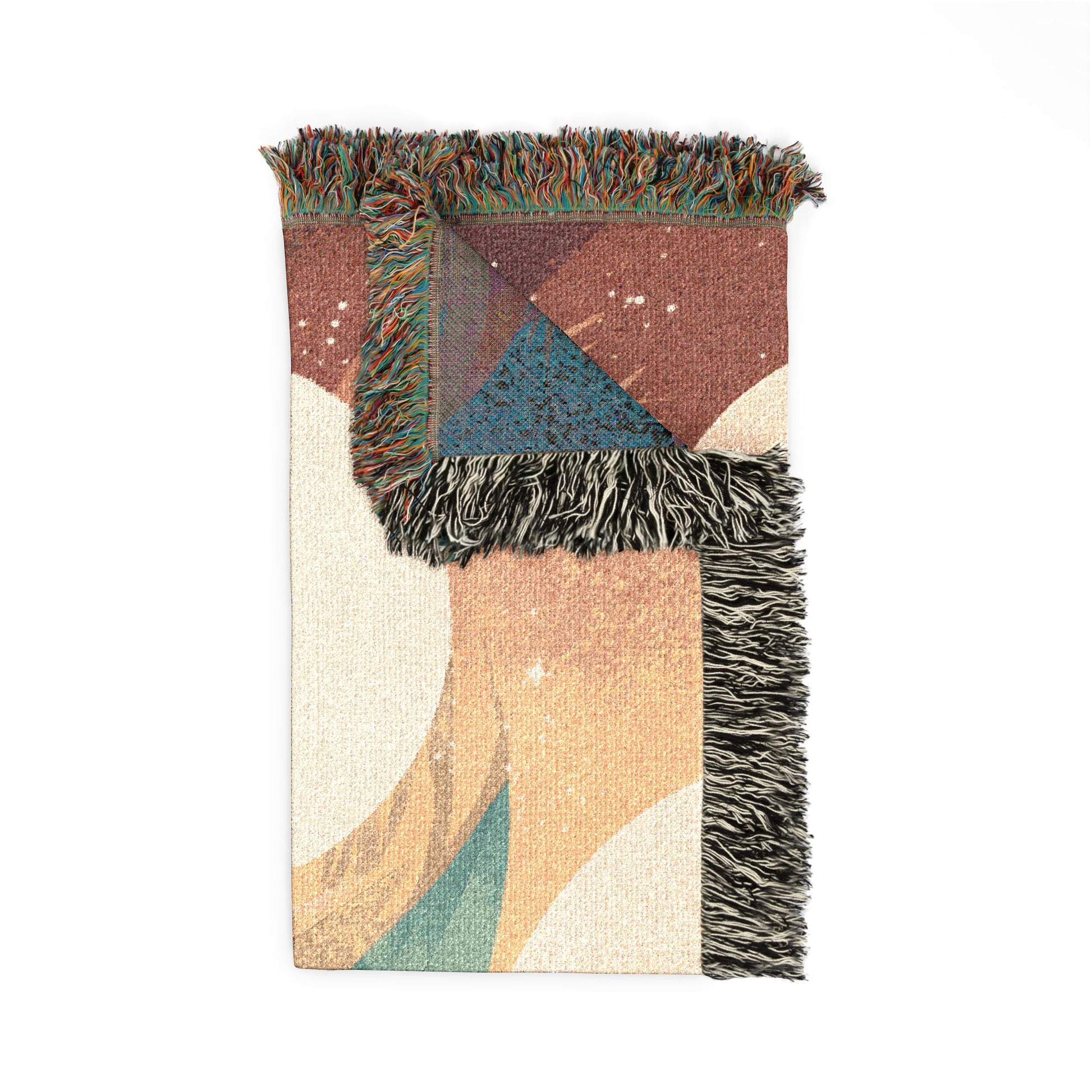 Multicolored woven blanket with geometric pattern and fringed edges on a white background
