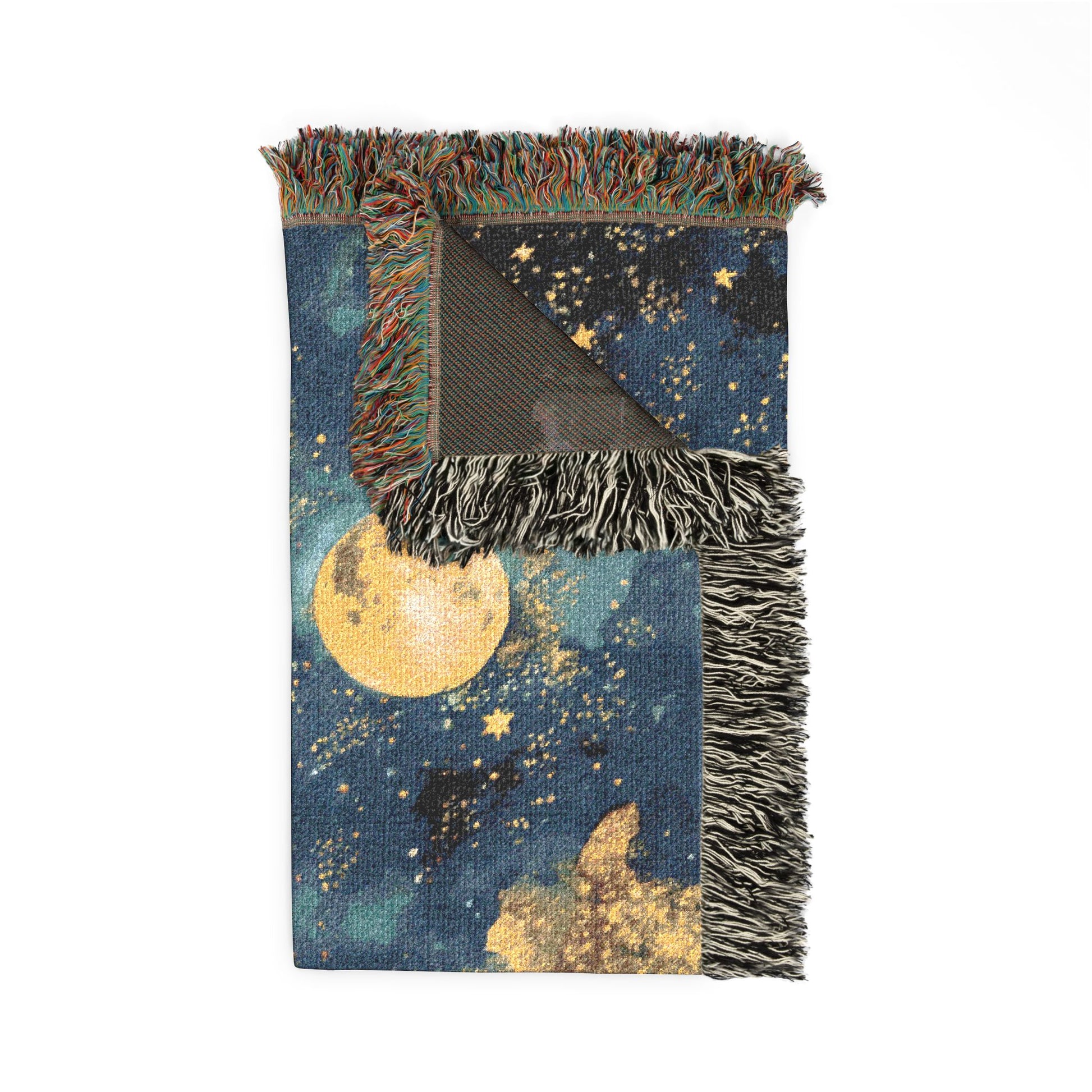Blanket with celestial design featuring a moon and stars on a blue background
